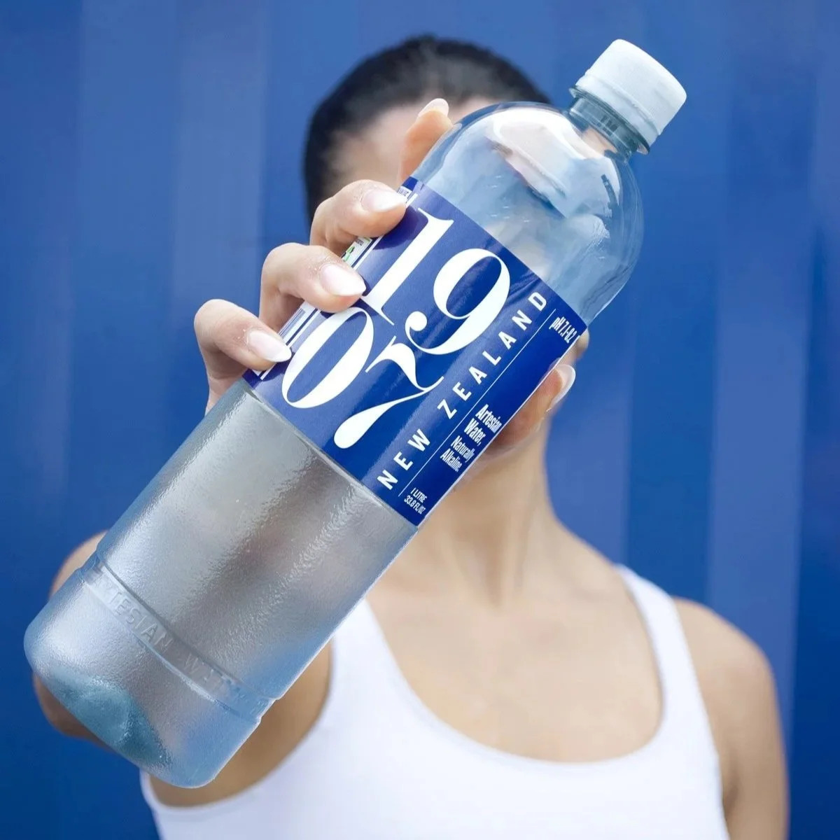 Close up of a bottle of 1907 New Zealand artesian water