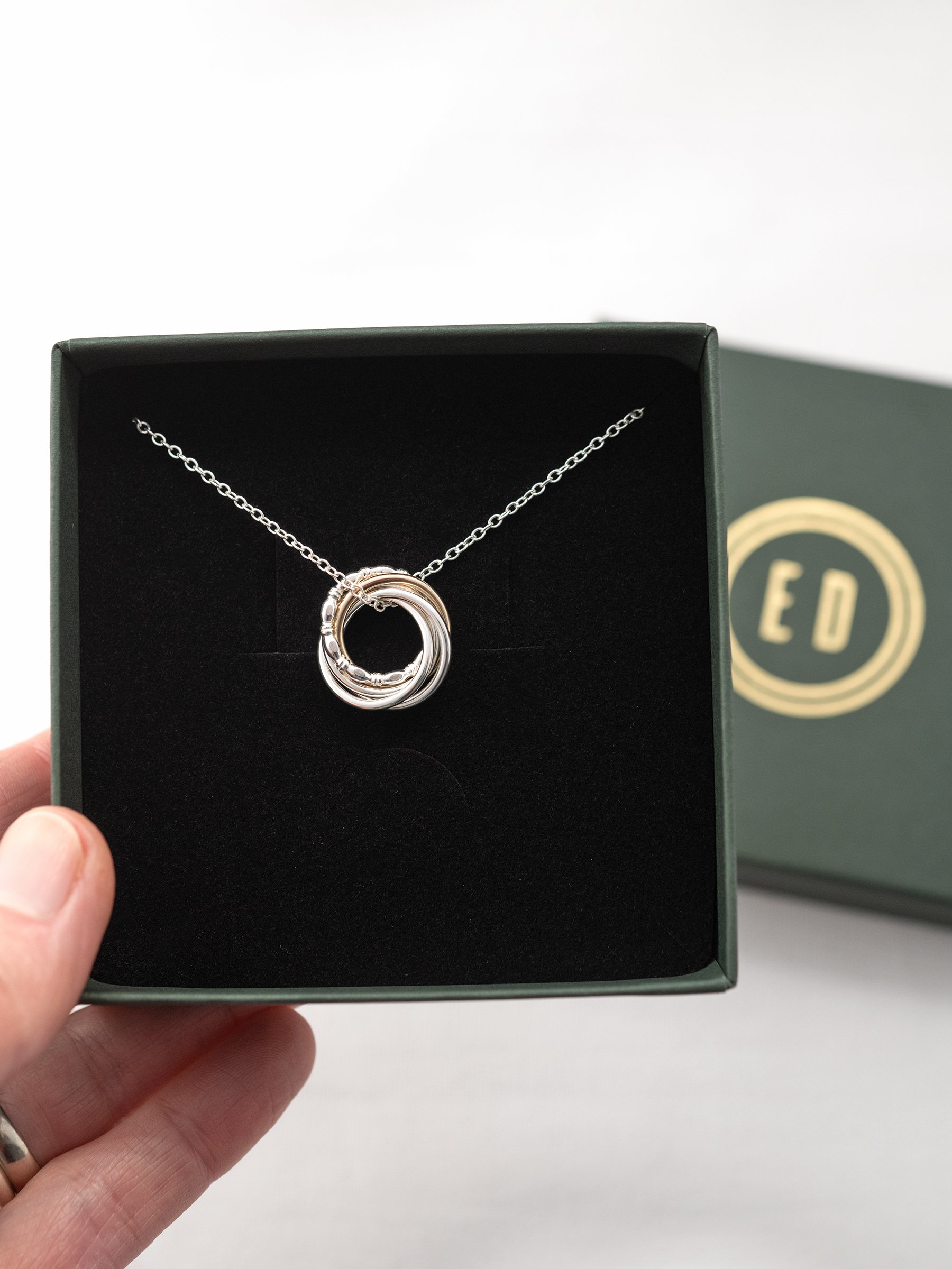 A unique 50th birthday necklace displayed in a jewellery presentation box.