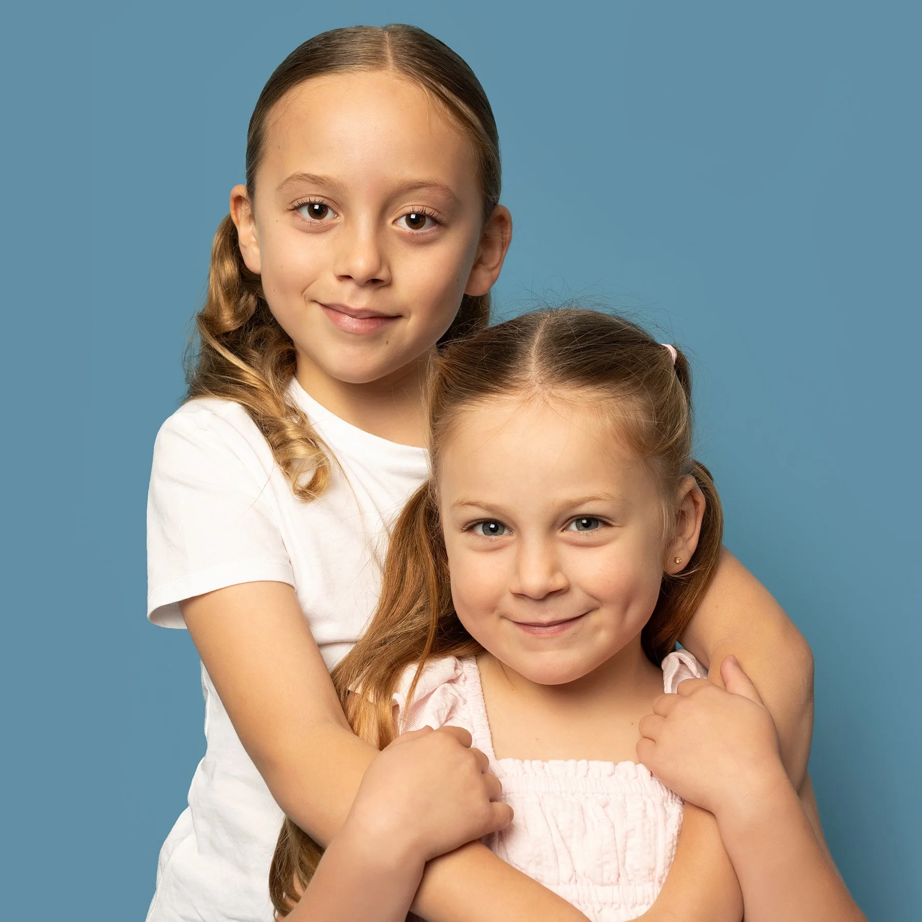 Smiling sisters