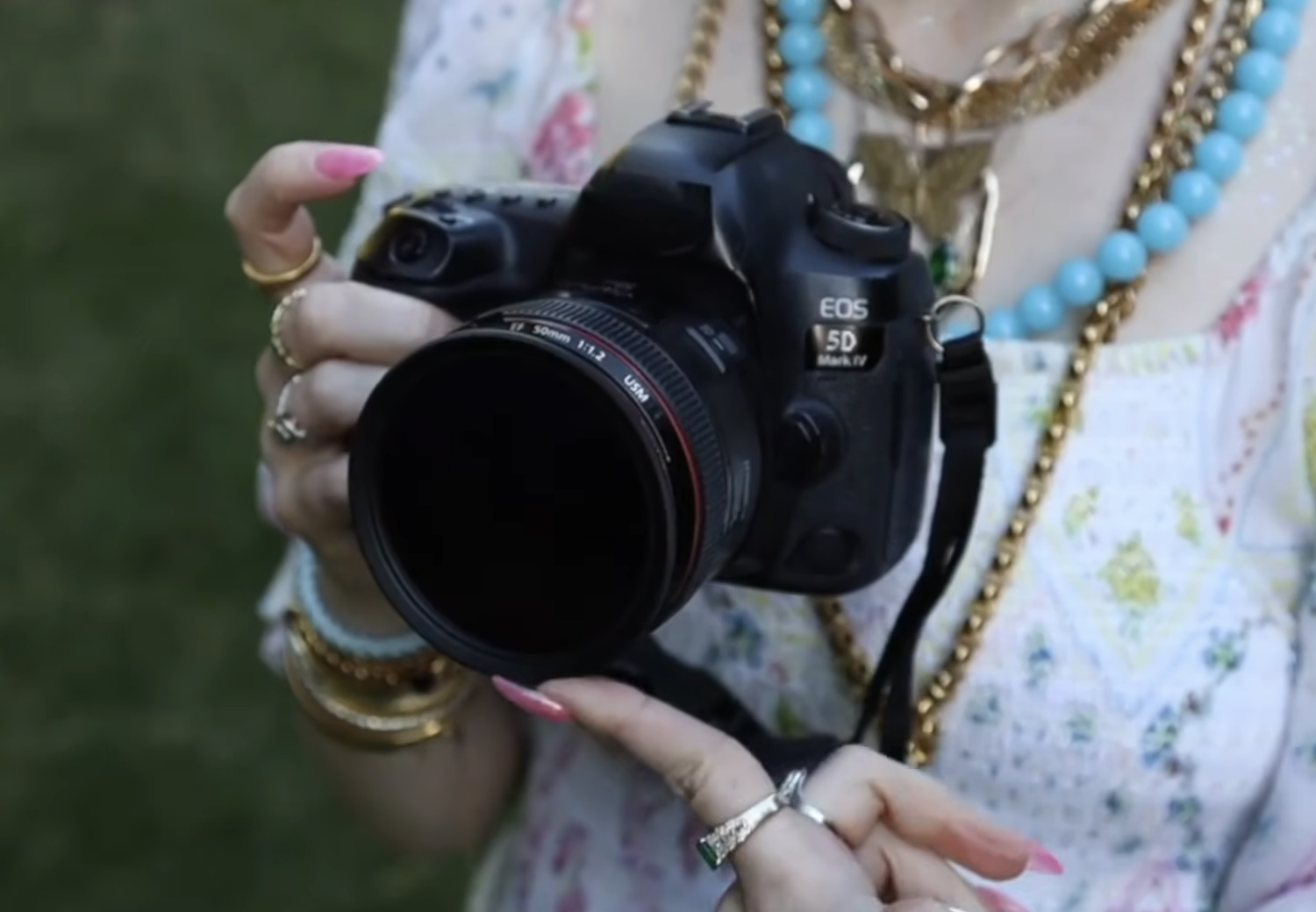 Close-up of a variable ND filter fully mounted on a DSLR camera lens to control exposure in harsh lighting conditions.