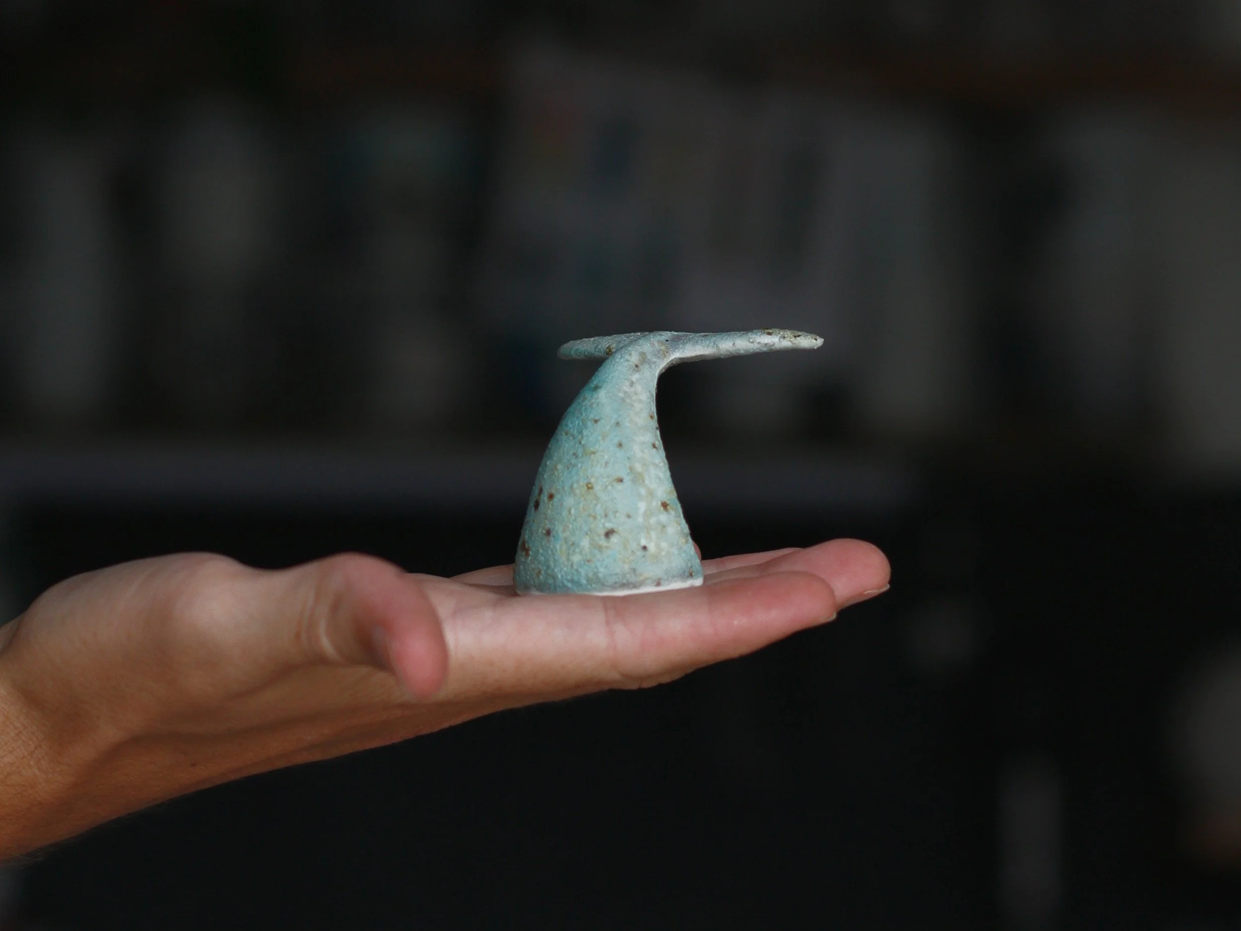 Pequena cauda em faiança