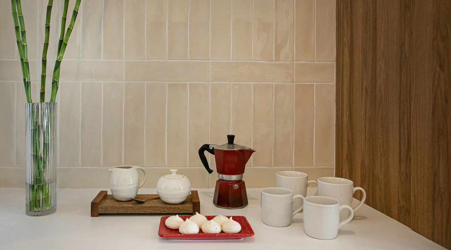 A STYLISH TOAST: From closet to cocktail hour…
By special request of these savvy owners, our team transformed an unused storage nook into a custom bar, complete with a Japanese tea service for serene arrivals. This once unused space is now t