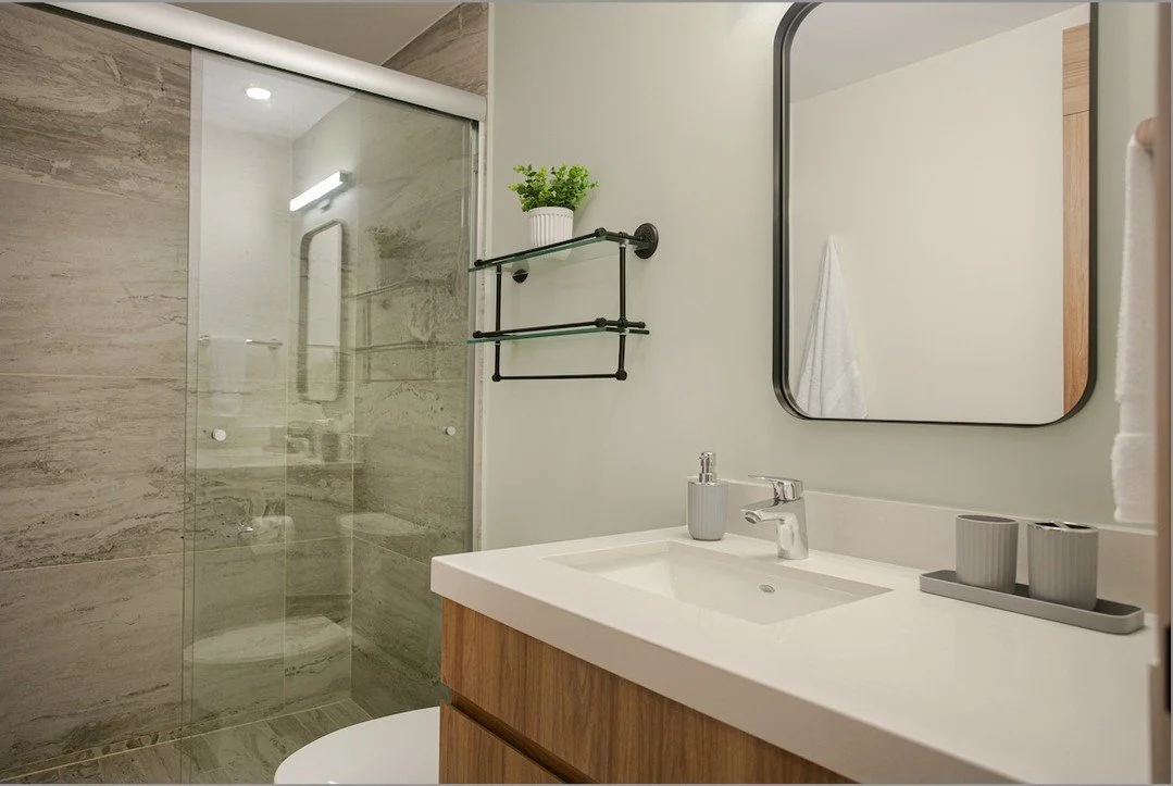 WASHROOM WONDERLAND: Look at the detail in this guest bathroom! 
🚿 We relied on the team at CRATE Interiors for everything, from the sleek vanity to the custom glass shower enclosure and the beautiful tile work. They knew exactly how to blend the n