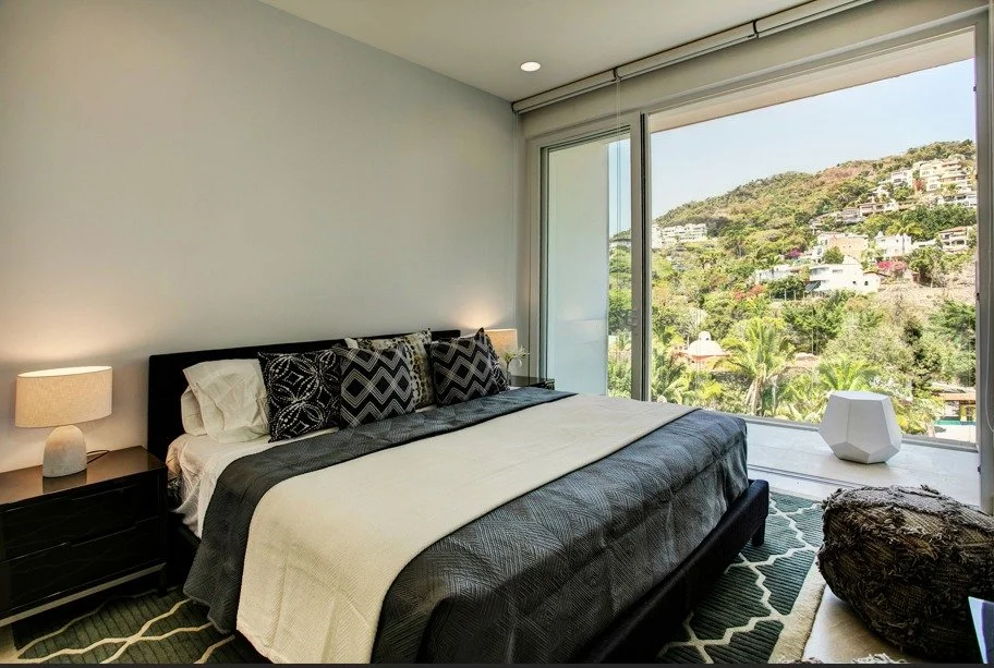 URBAN COOL MEETS COASTAL CALM 🛋️ 

Inside our homes, the palette is all about masculine neutrals, layered textures, and timeless materials. It feels elevated yet livable&mdash;a place where we can truly kick back. 

The custom window treatments and 