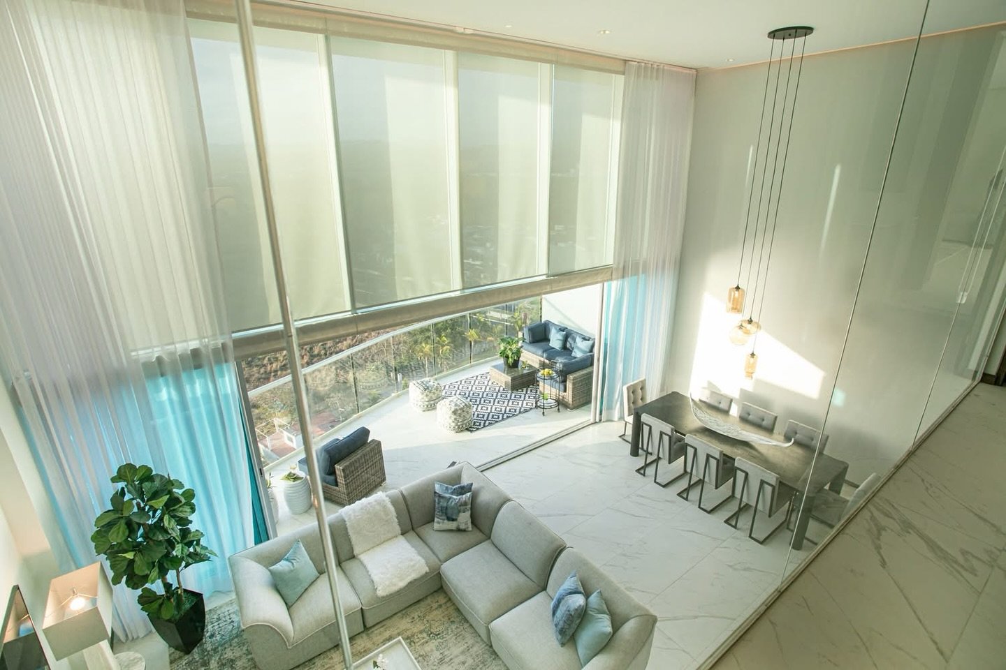 FOREVER HOME IN PARADISE: This penthouse has everything.

What drew our Chicago investors to this unique property was more than the double-height ceilings, glass walls, ocean views and a stunning open-plan layout. It was the potential to be a top per