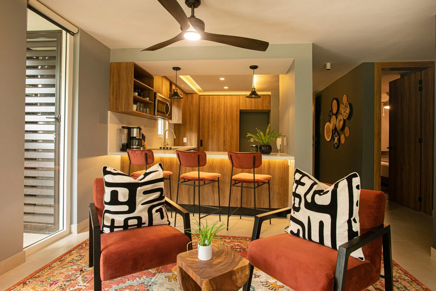 A HILLSIDE JUNGLE RETREAT: Set high up on the tropical hillside of Amapas MX, this jungle retreat overlooks the Bay of Banderas and is comfortably nestled between sky and sea. Created for a rental property investor from Austin TX, this condo is desig