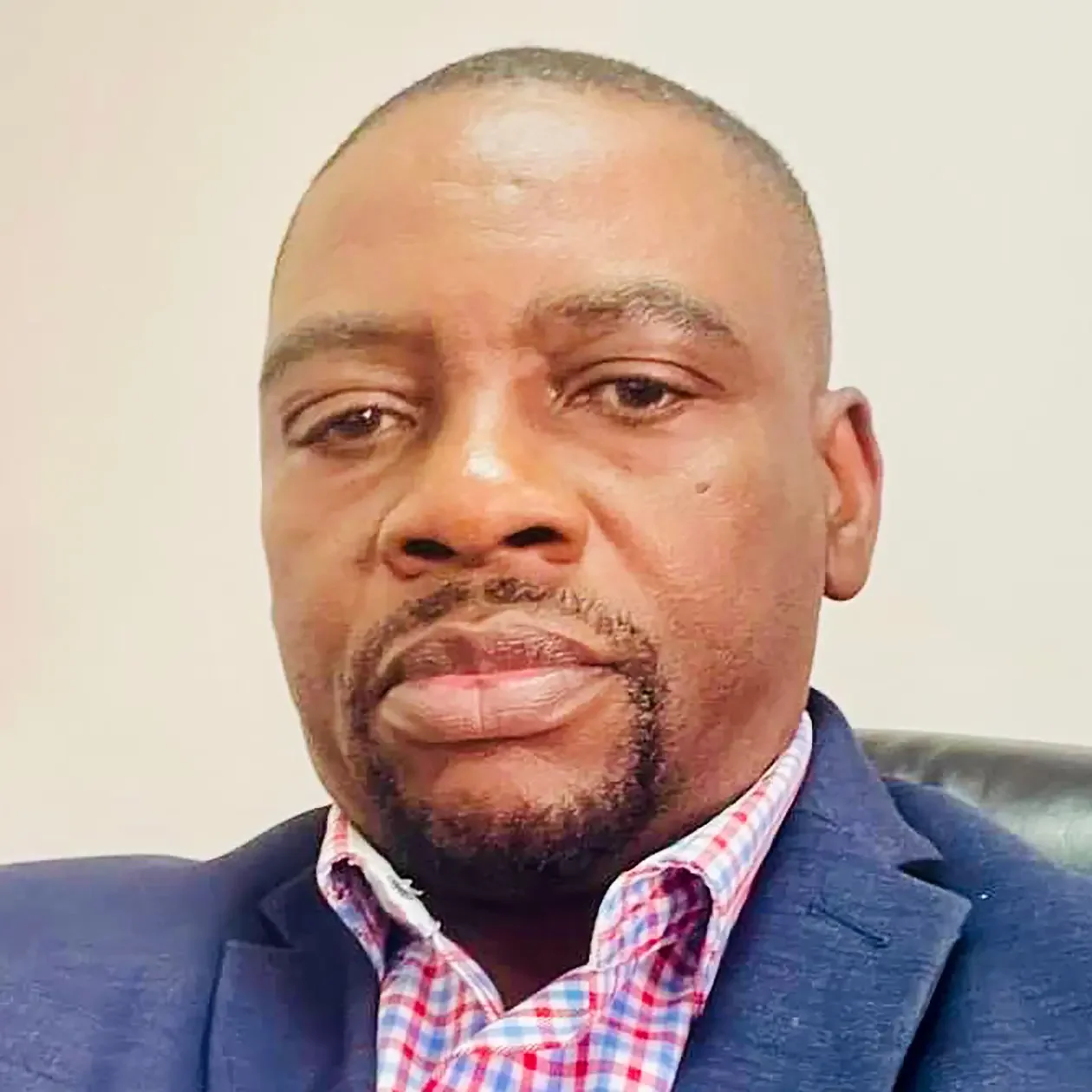 Mr. Titus C. Mwandemena