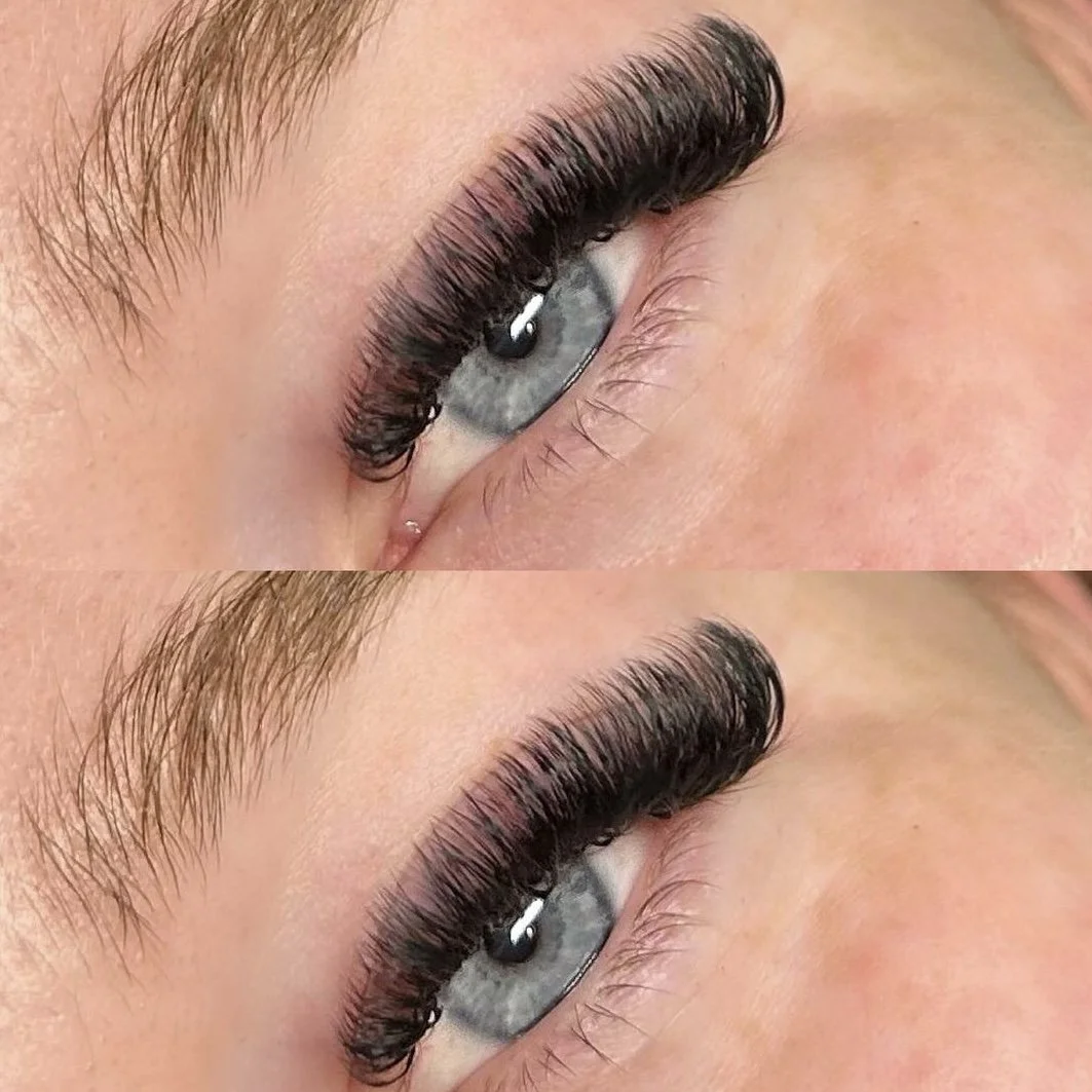 Close-up of a person's eye with long, thick eyelashes