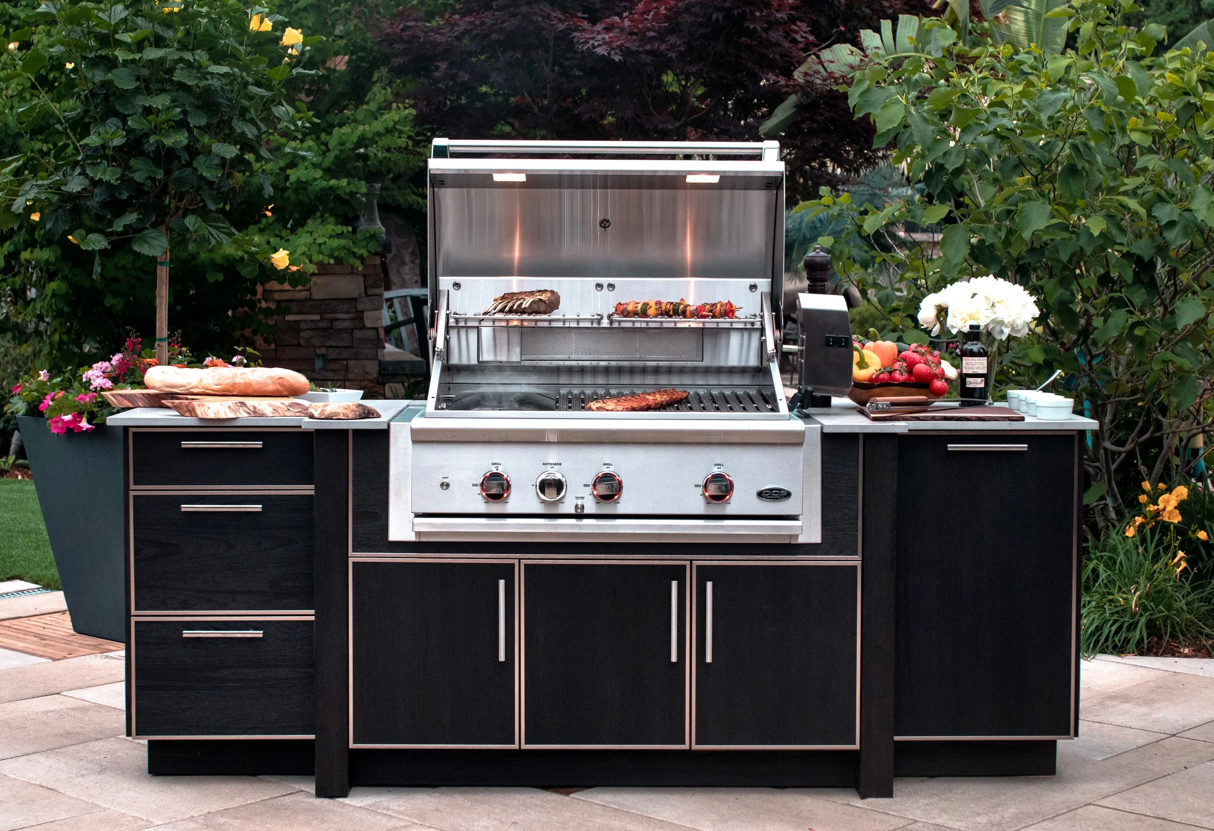 grill-island-with-food-on NatureKast-cabinets-picture-by-Koru-Creative.jpg
