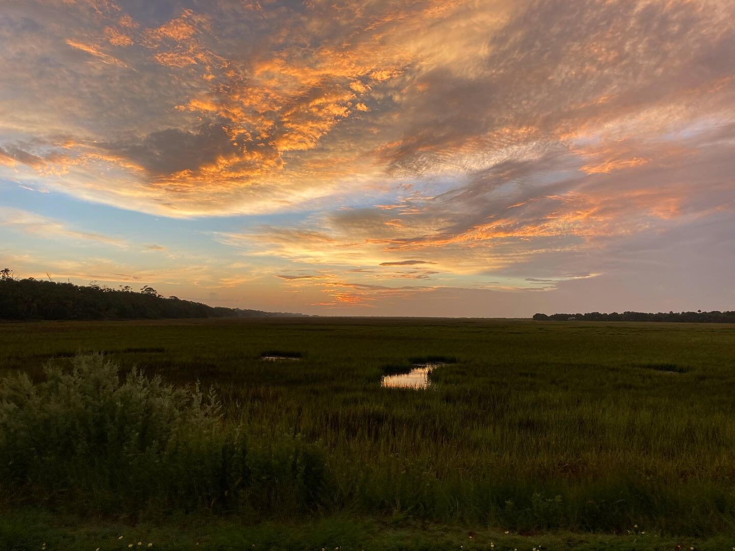 Some epic #sunrises and some good examples of how to make any #redfish look bigger. #longarms #edisto #edistobeach #lowcountry #southcarolina #fishsc #fishthecarolinas #edistofishing #fishingedisto #southcarolinafishing #saltwater #saltwaterfishing #