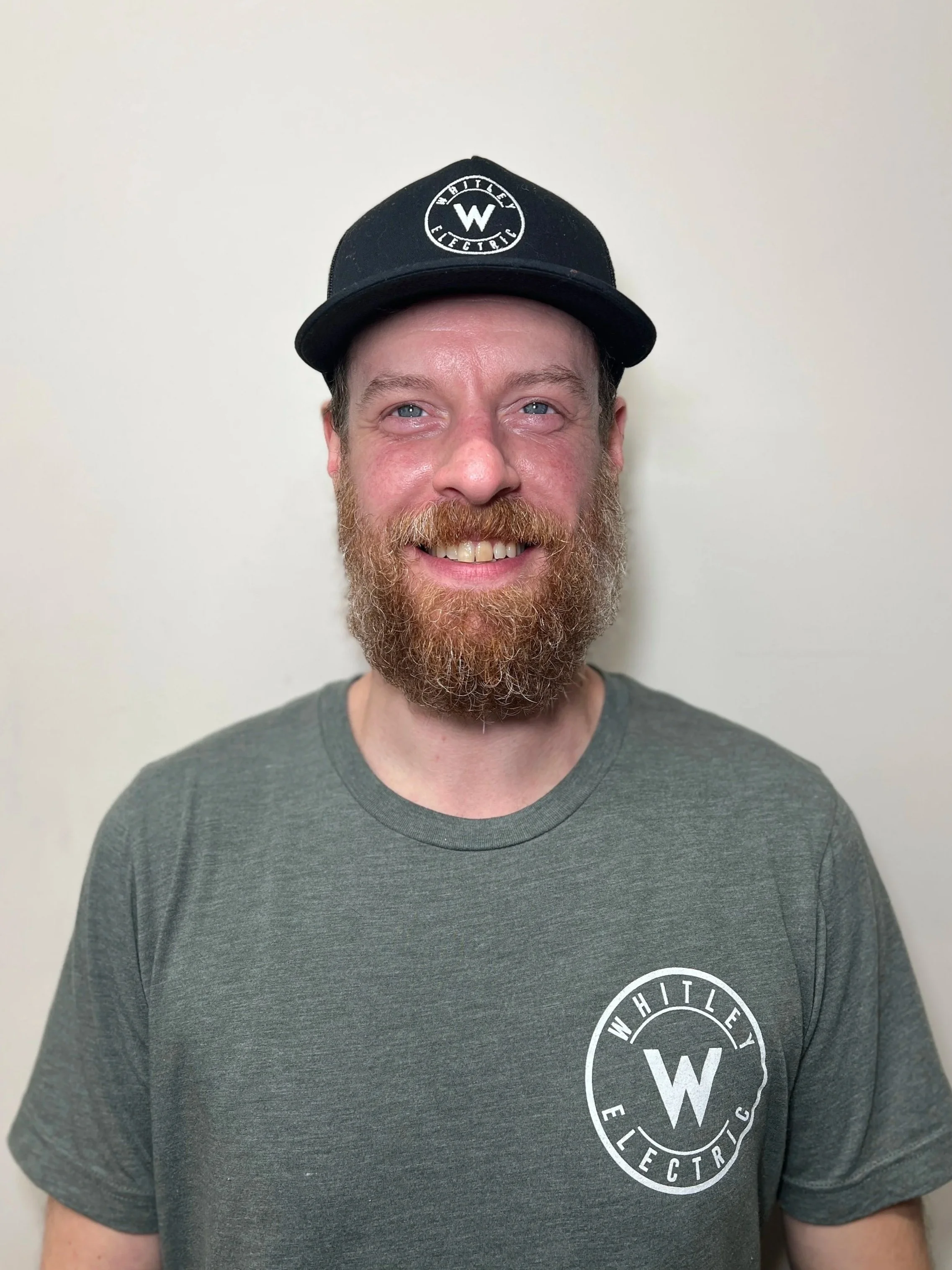 Vancovuer electrician posing for a photo with Whitley Electric