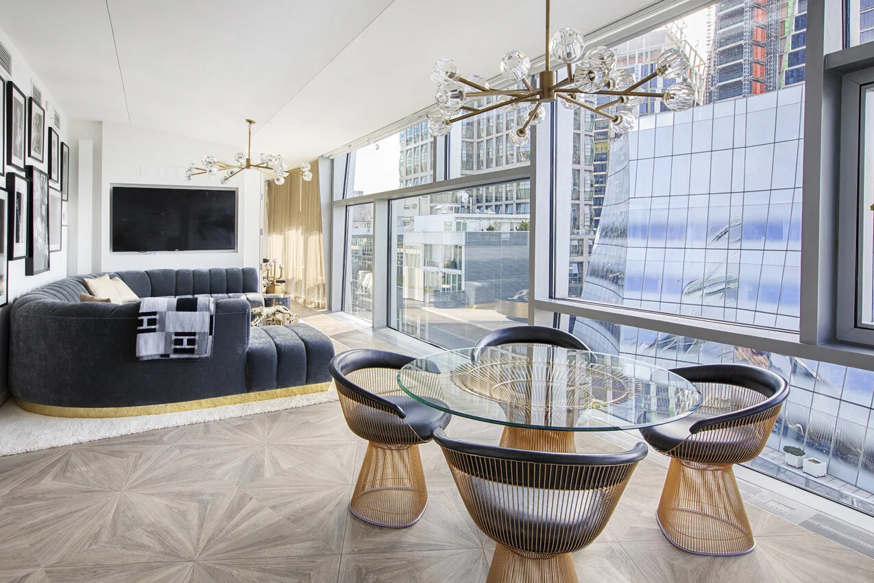Kitchen range wall in Chelsea NYC apartment, designed by Gregory Hitchcock Design.