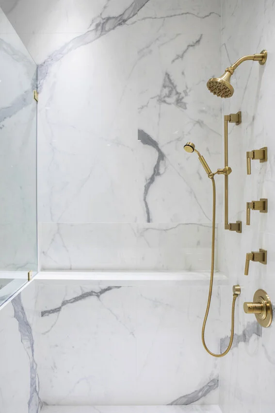 Bathroom overview in Chelsea NYC apartment, designed by Gregory Hitchcock Design.