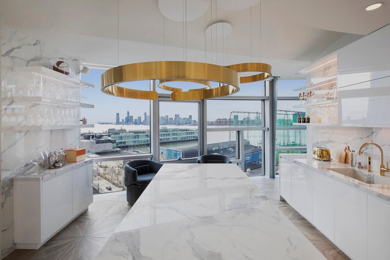 Modern kitchen in Chelsea NYC apartment at 100 11th Ave, designed by Gregory Hitchcock Design.