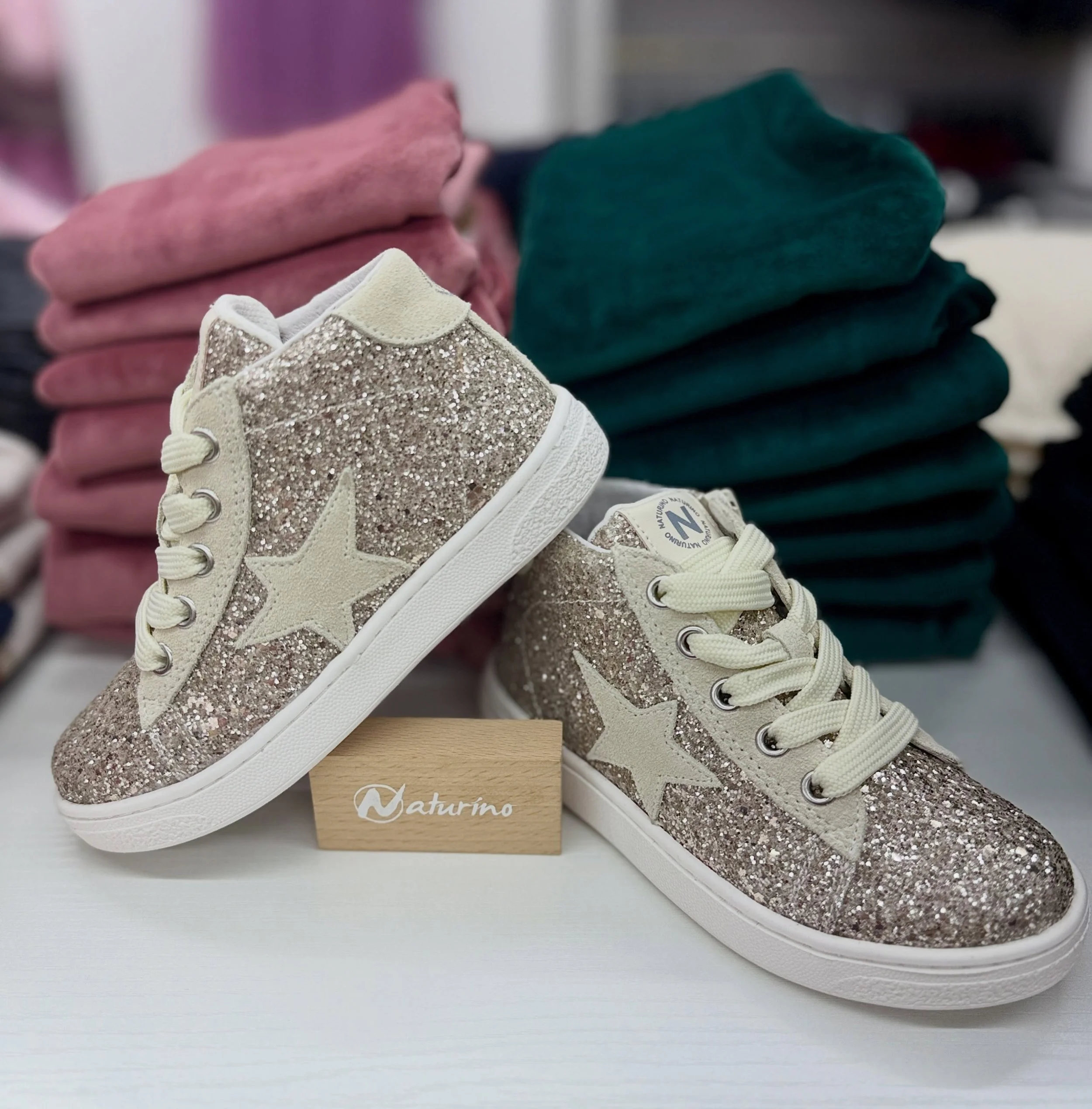 SHINE ON with our new Naturino Pinn high top sneakers! Stop in for your free, personalized sizing and walk home in sparkling style✨ 

📍157 Chambers St