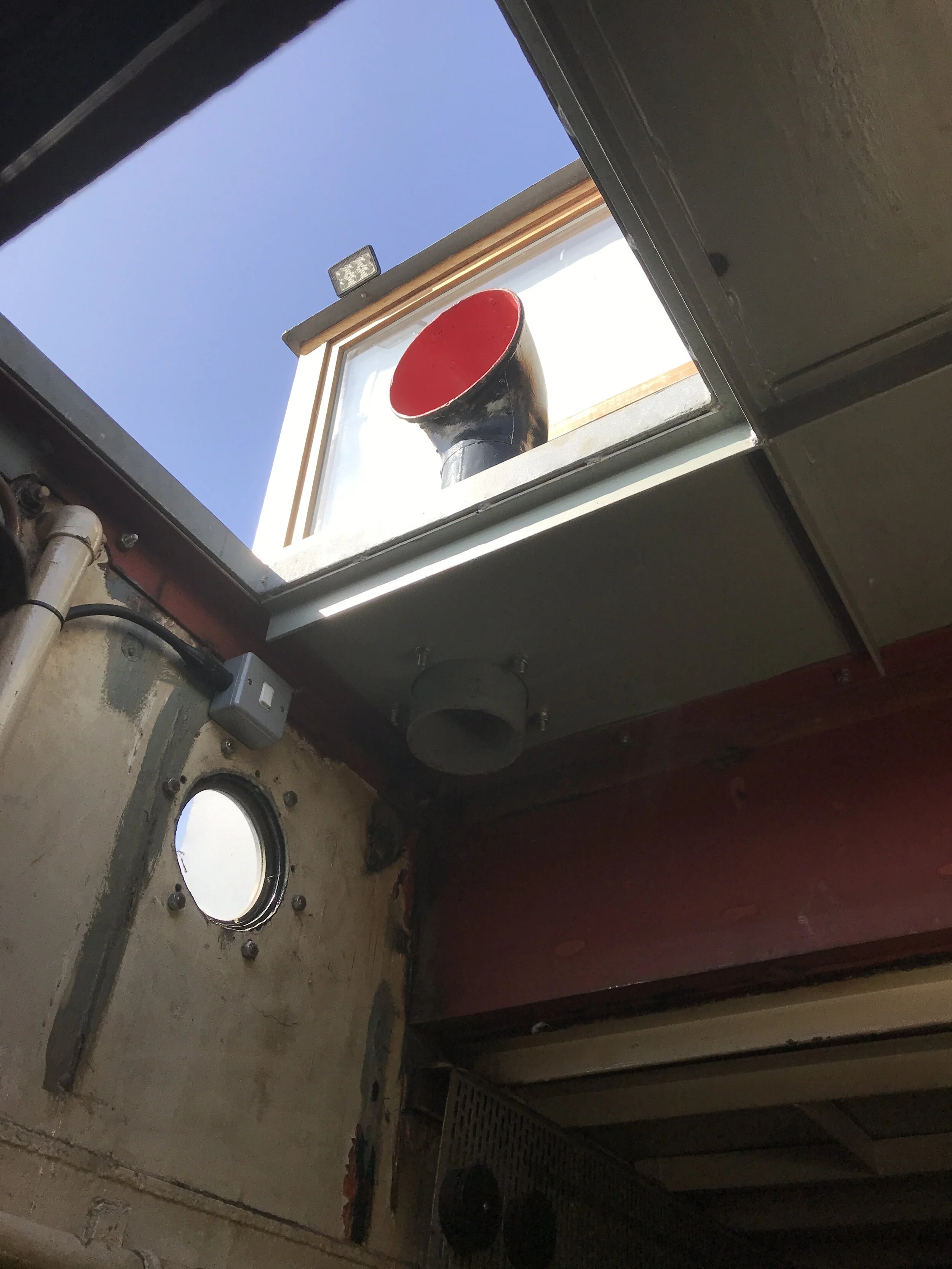 Back deck access hatch to engine room