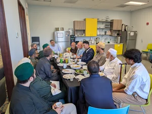 A community dinner in the MFC caf&eacute;