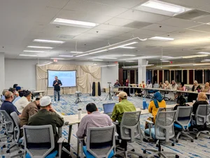 A presentation to a full room set up classroom style