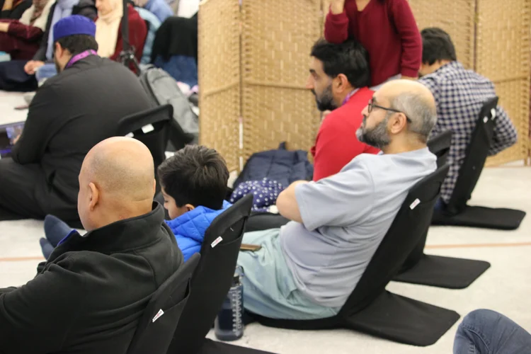 Brothers and children at a talk