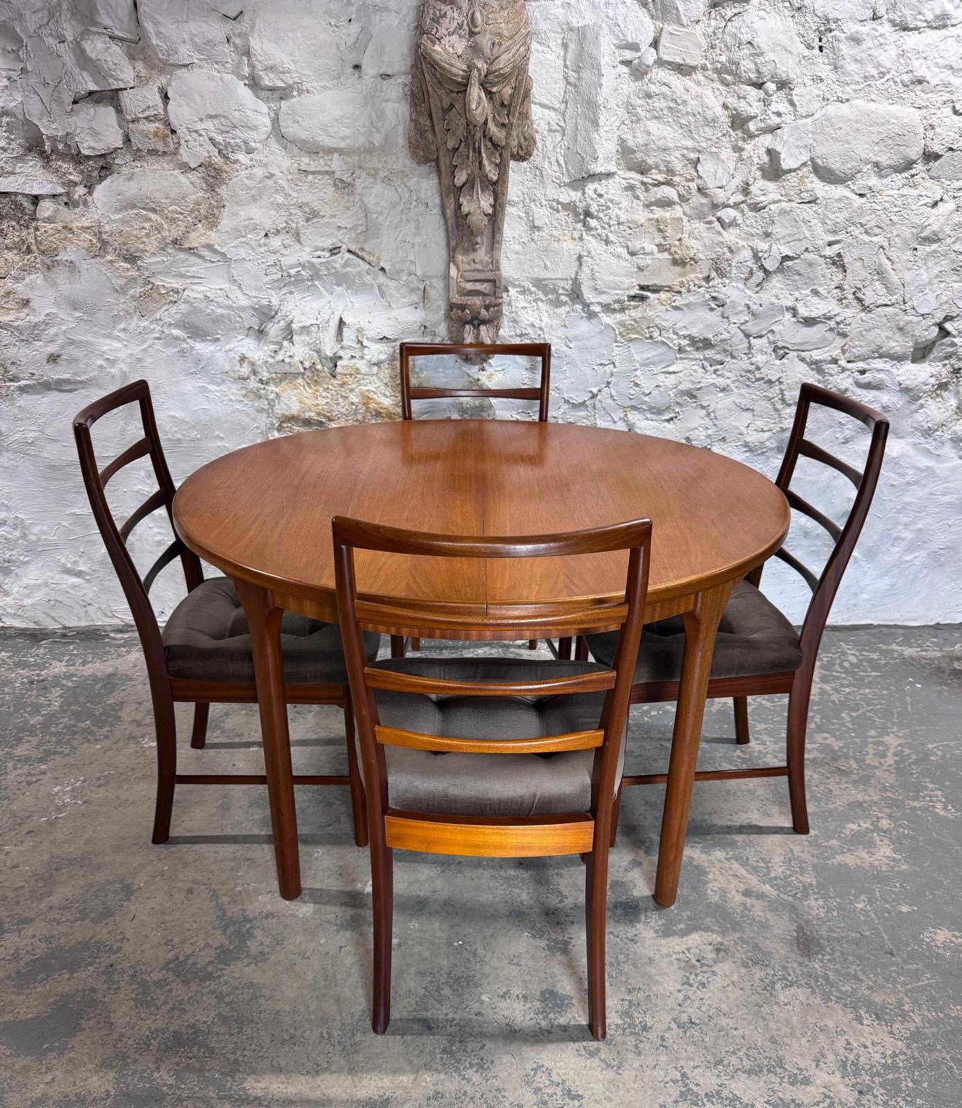 Mid Century Modern Teak Extendable Dining Table and Chairs by McIntosh