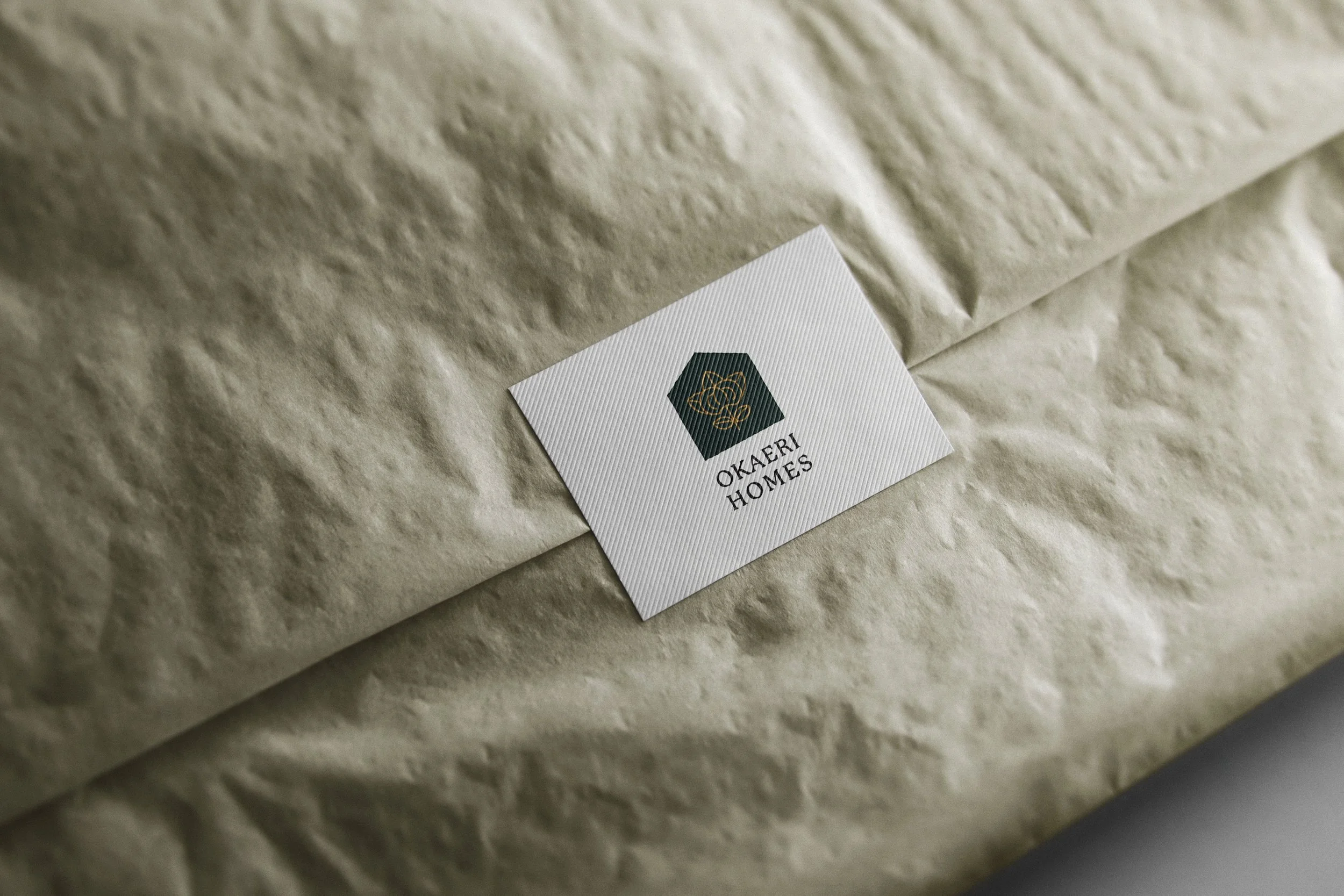 Okaeri-Homes-Tag-on-paper-1.jpg