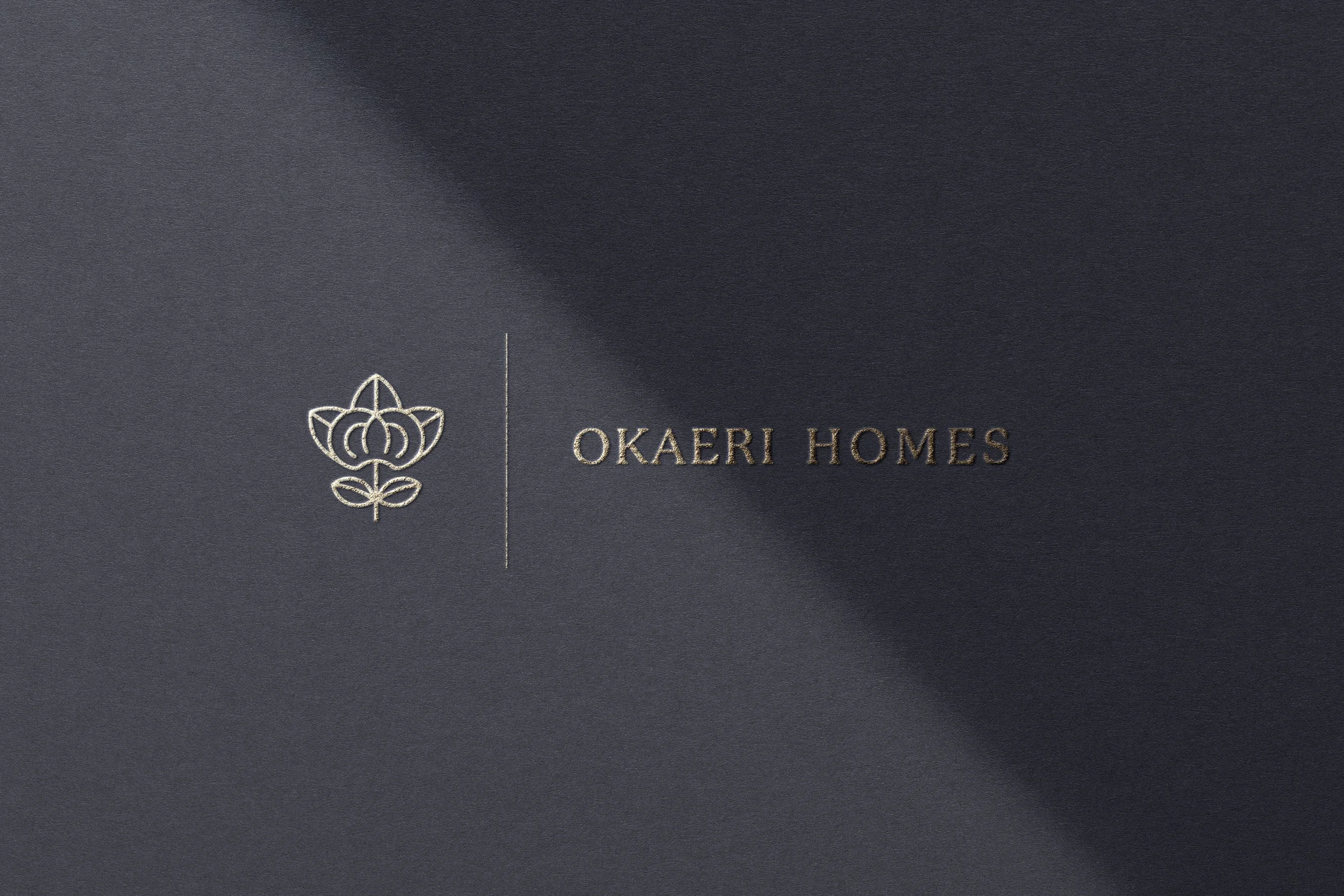 Okaeri-Homes-Gold-on-Black-Logo-1.jpg