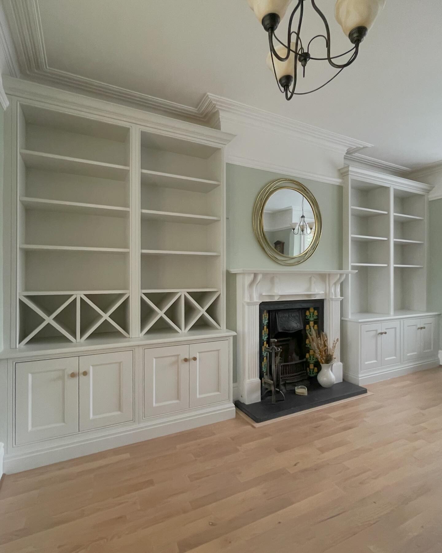 A beautiful pair of alcove units completed in Caversham Heights this week. Incorporating a lovely wine storage design which can hold a total of 48 bottles. 
These alcove units have a traditional in frame design with cock beading face frames, with a m