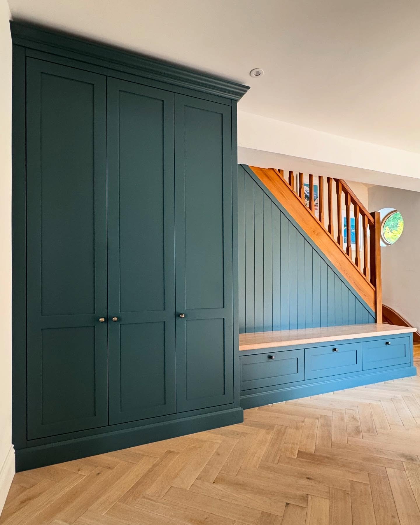 This entrance hall was recently transformed into a practical and stylish boot room with bespoke square in-frame cabinetry, finished with traditional, timeless shaker doors, and subtle cornice and skirting details that tie in seamlessly with the rest 
