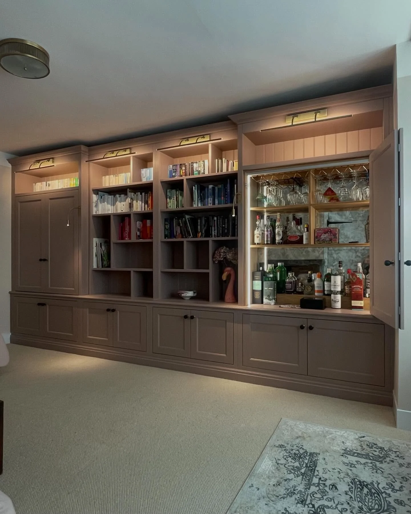 Revisiting this one&hellip; and it still feels just as impressive as the first time around.

A bespoke unit designed to keep everything in its place. On the left, the TV sits hidden behind shaker doors, disappearing completely when not in use. Throug