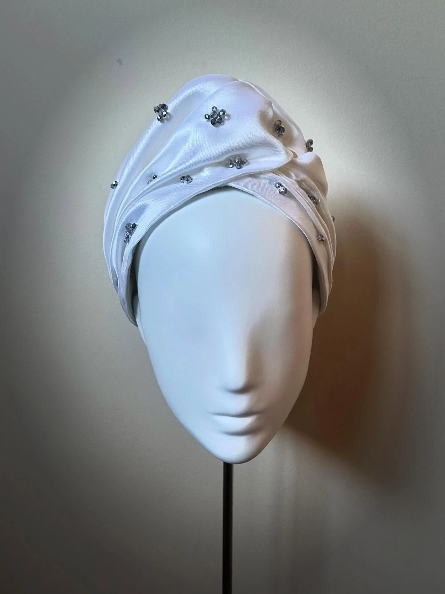 Custom white silk beaded turban was on the bench this week, inspiring an upcoming series of turbans and other draped fabric pieces, perfect transeasonal accessories for a multitude of occasions 🤍