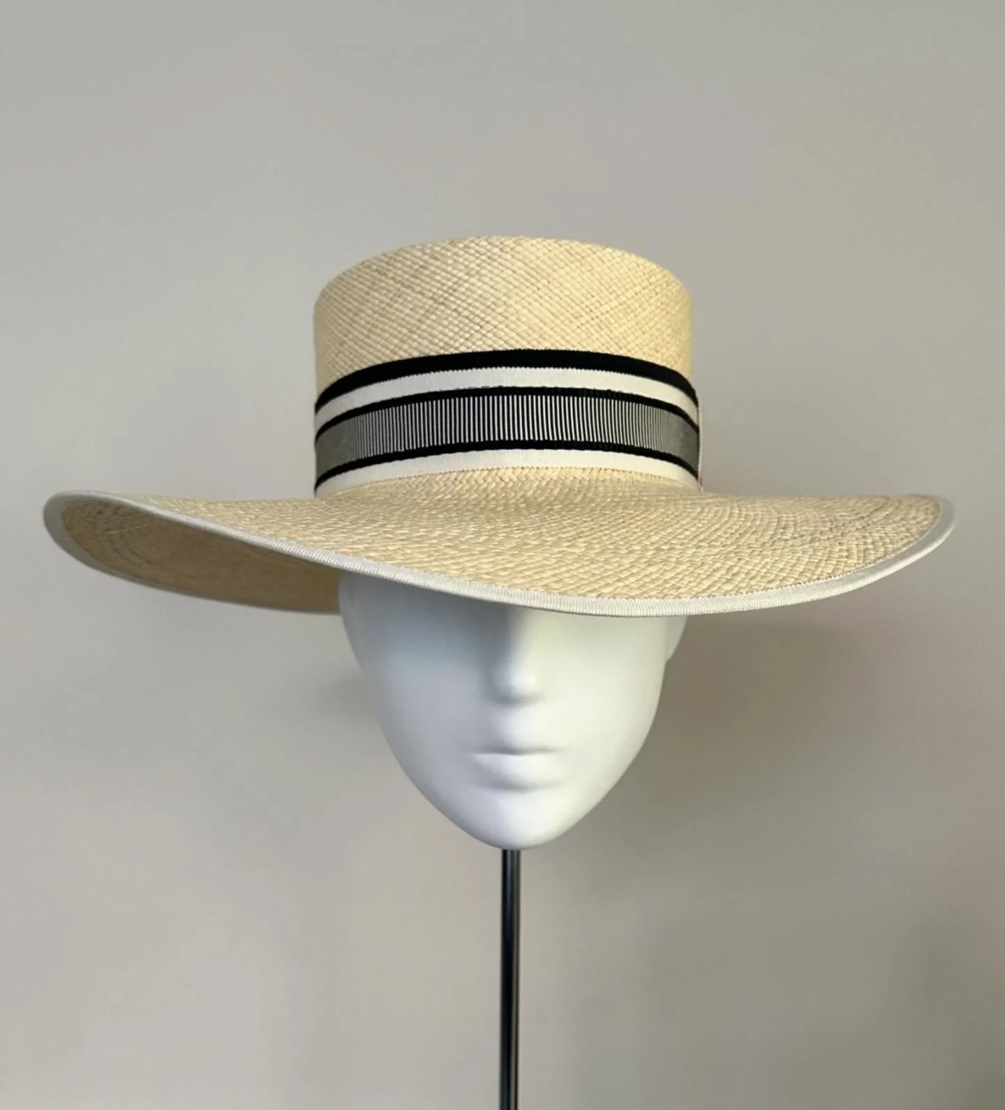 Classic Panama flat top sun hat with bespoke ribbon trim and tipped brim to keep you sun safe and chic at all your summer events!