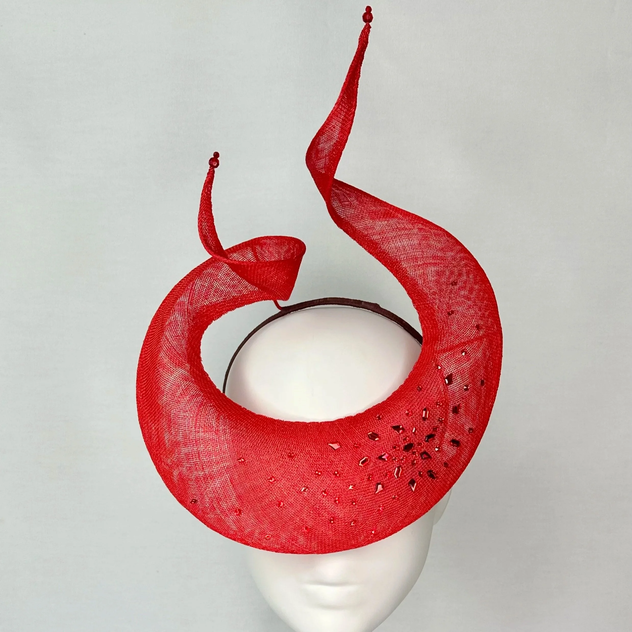 Sculpted sinamay swirl
