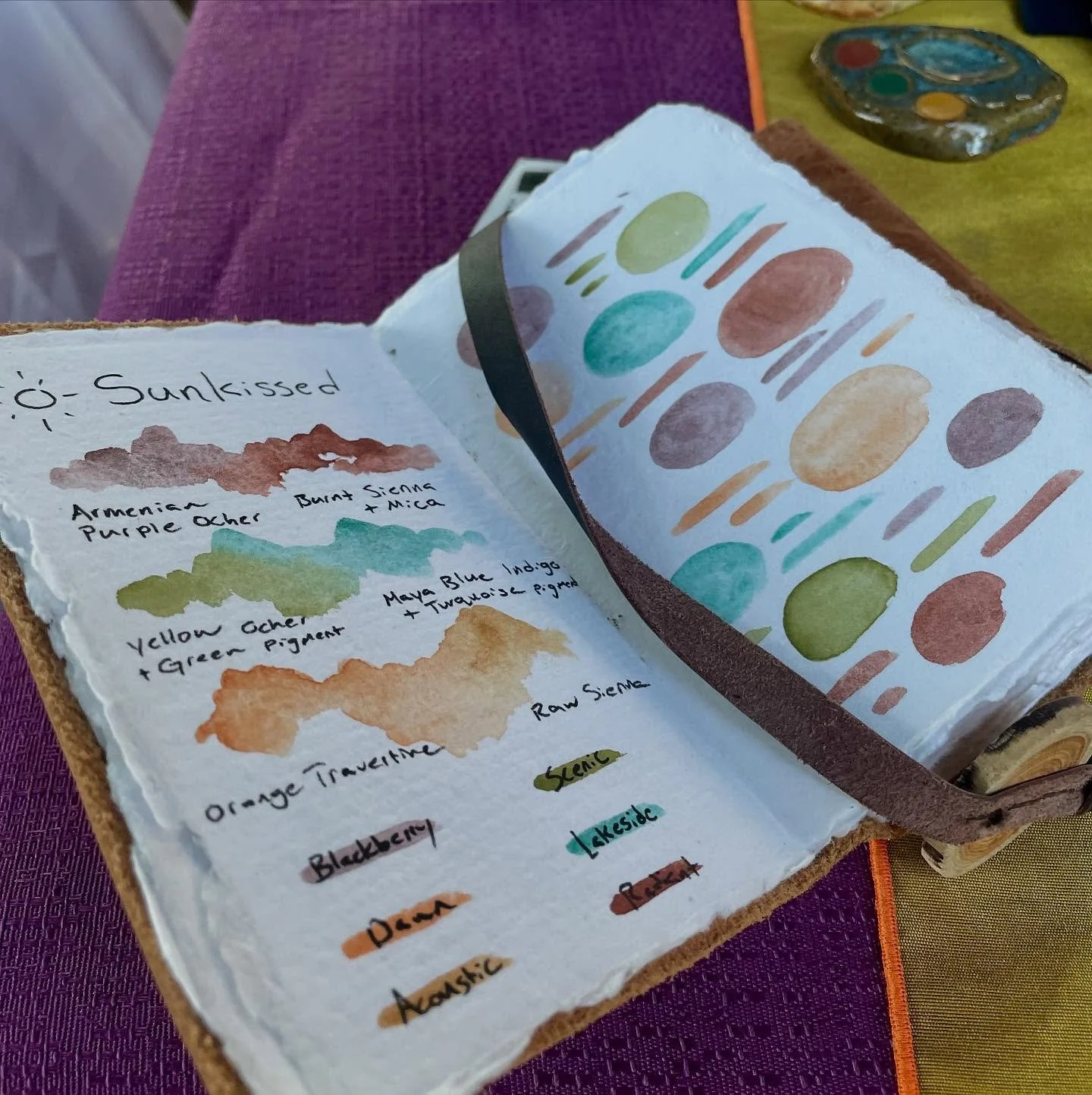 This watercolor sketchbook was spotted at the Woodland Art Fair! Madison of @mona.earthpaints makes all of these beautiful eco-friendly watercolors and was using her watercolor sketchbook as a demonstration. This paper is handmade in India, archival,