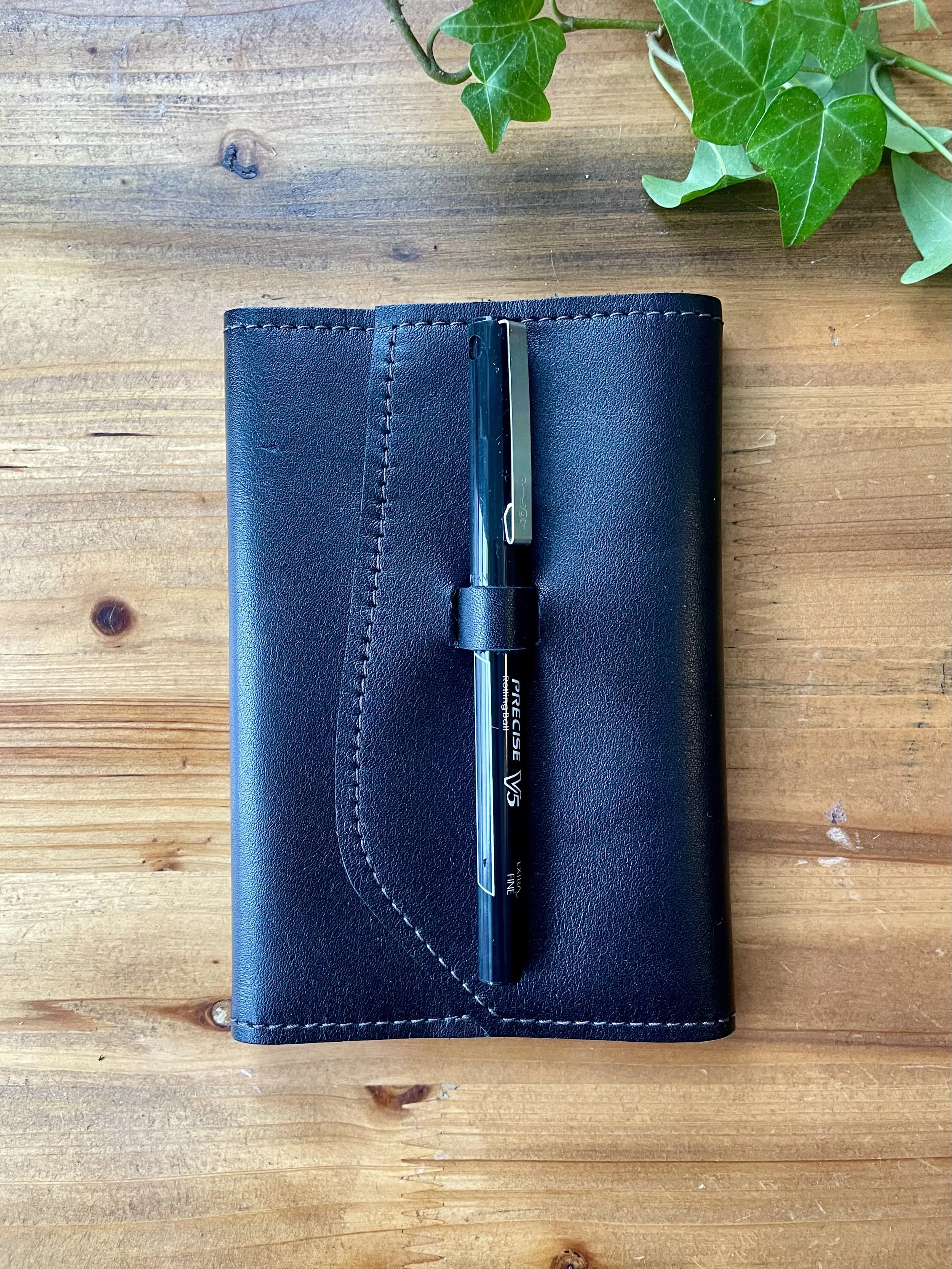Small, Refillable: Black Leather Notebook with Pen Closure