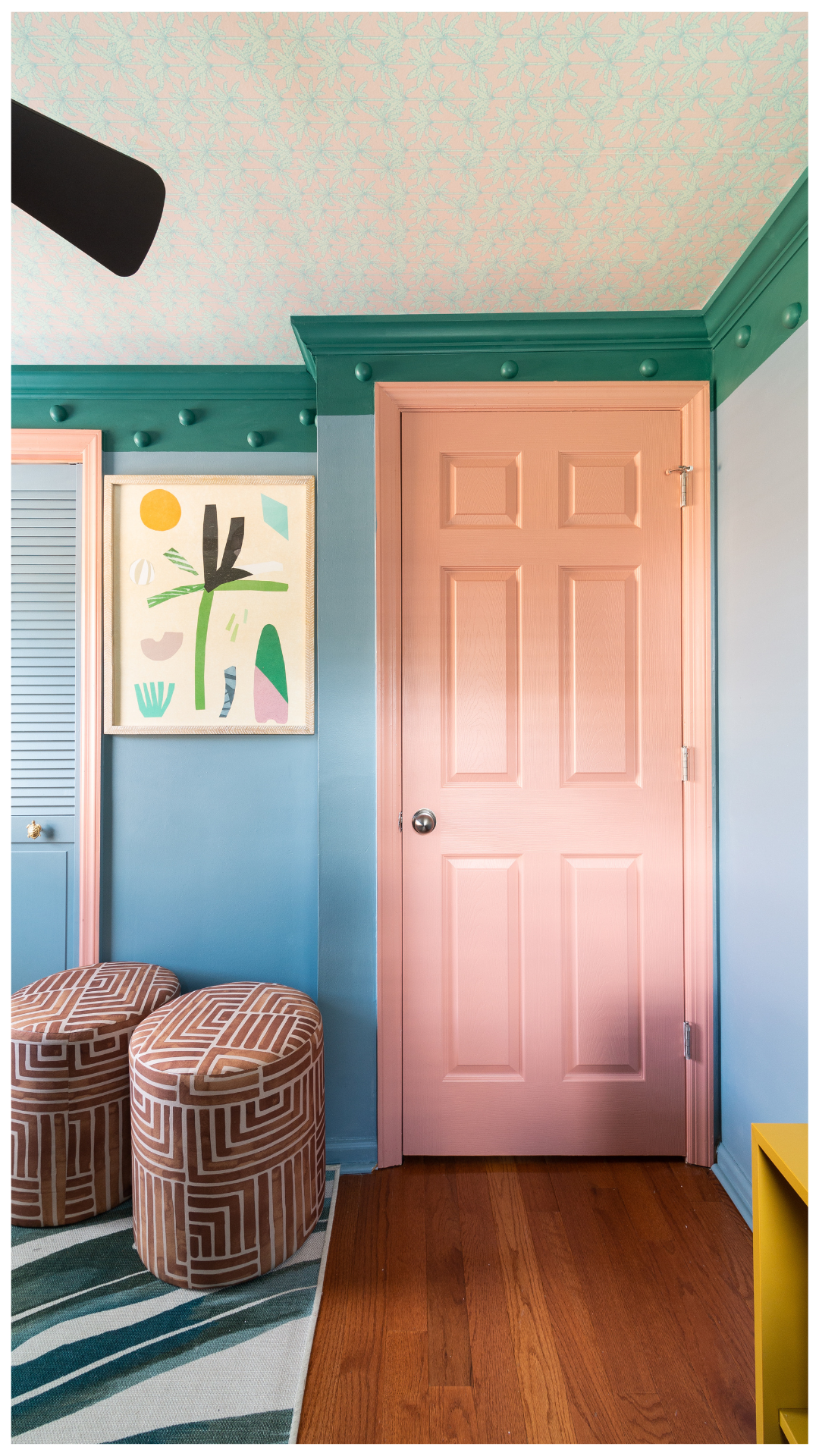A luxury kids' shared bedroom featuring a custom wooden trundle bed system, maximalist botanical murals, and a geometric patterned ceiling, engineered for spatial efficiency and multi-generational hosting.