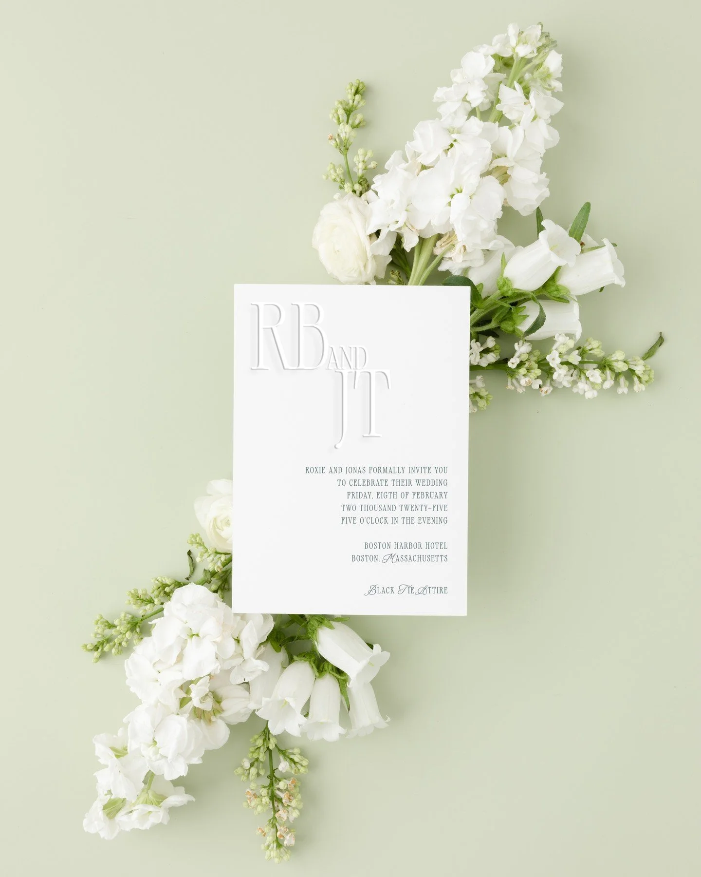 A little luck, a lot of love, and the perfect touch of letterpress. This Boston wedding invitation brings all the charm with deep green ink and elegant embossing&mdash;because timeless details never go out of style.

#weddinginvitations #letterpressl