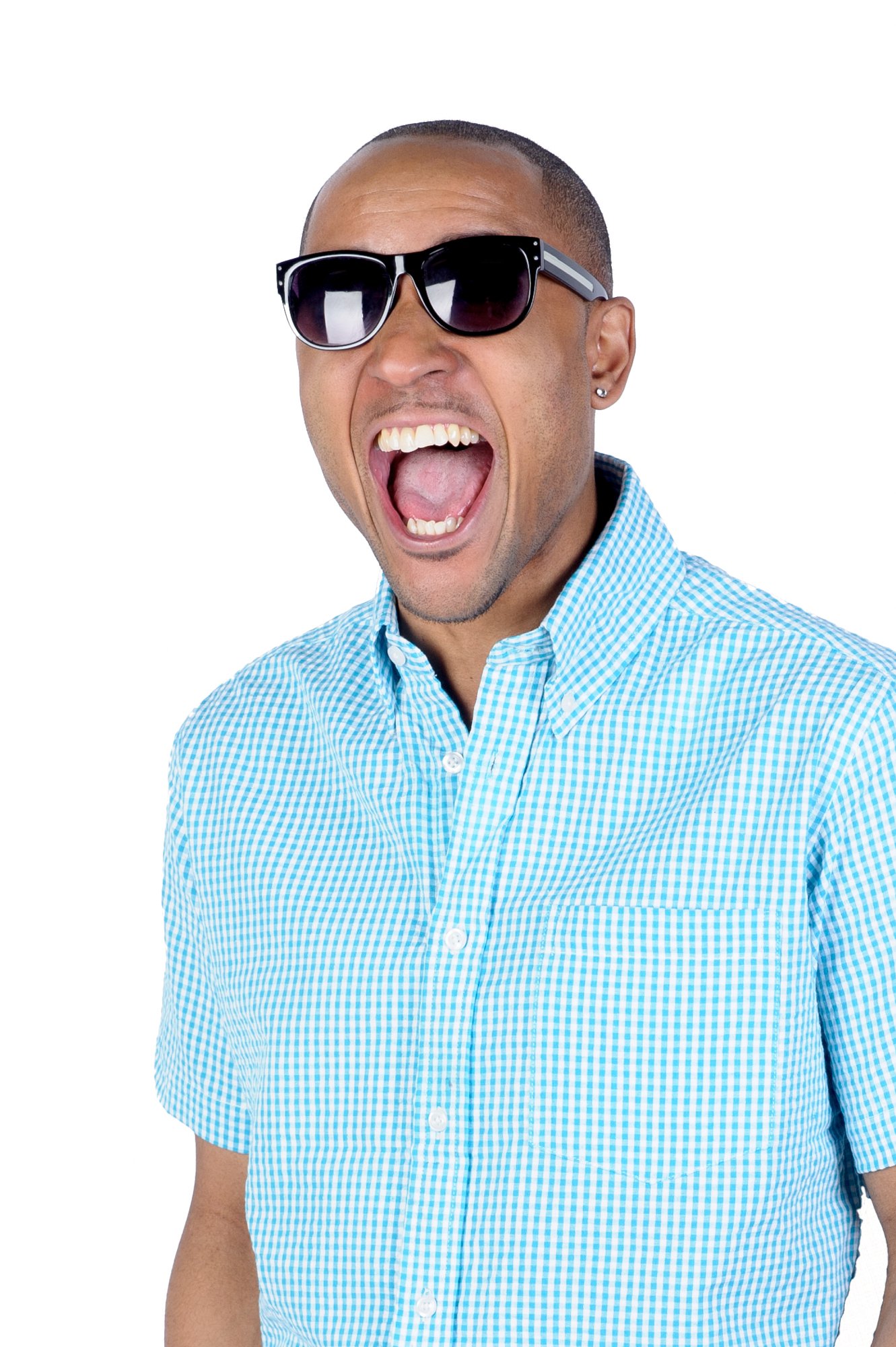 Man in sunglasses wearing a blue checkered shirt, laughing with mouth open wide.