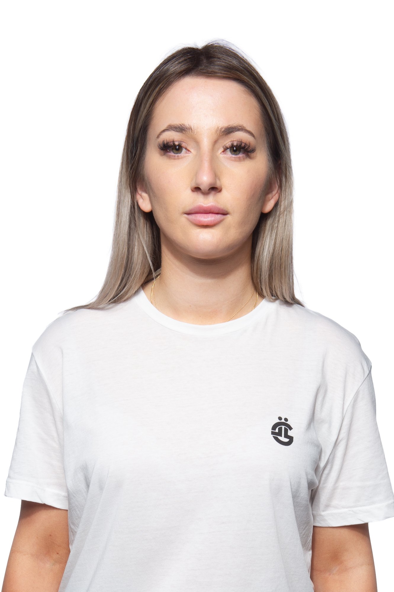 Woman with long hair wearing a white T-shirt, looking directly at the camera, against a white background.