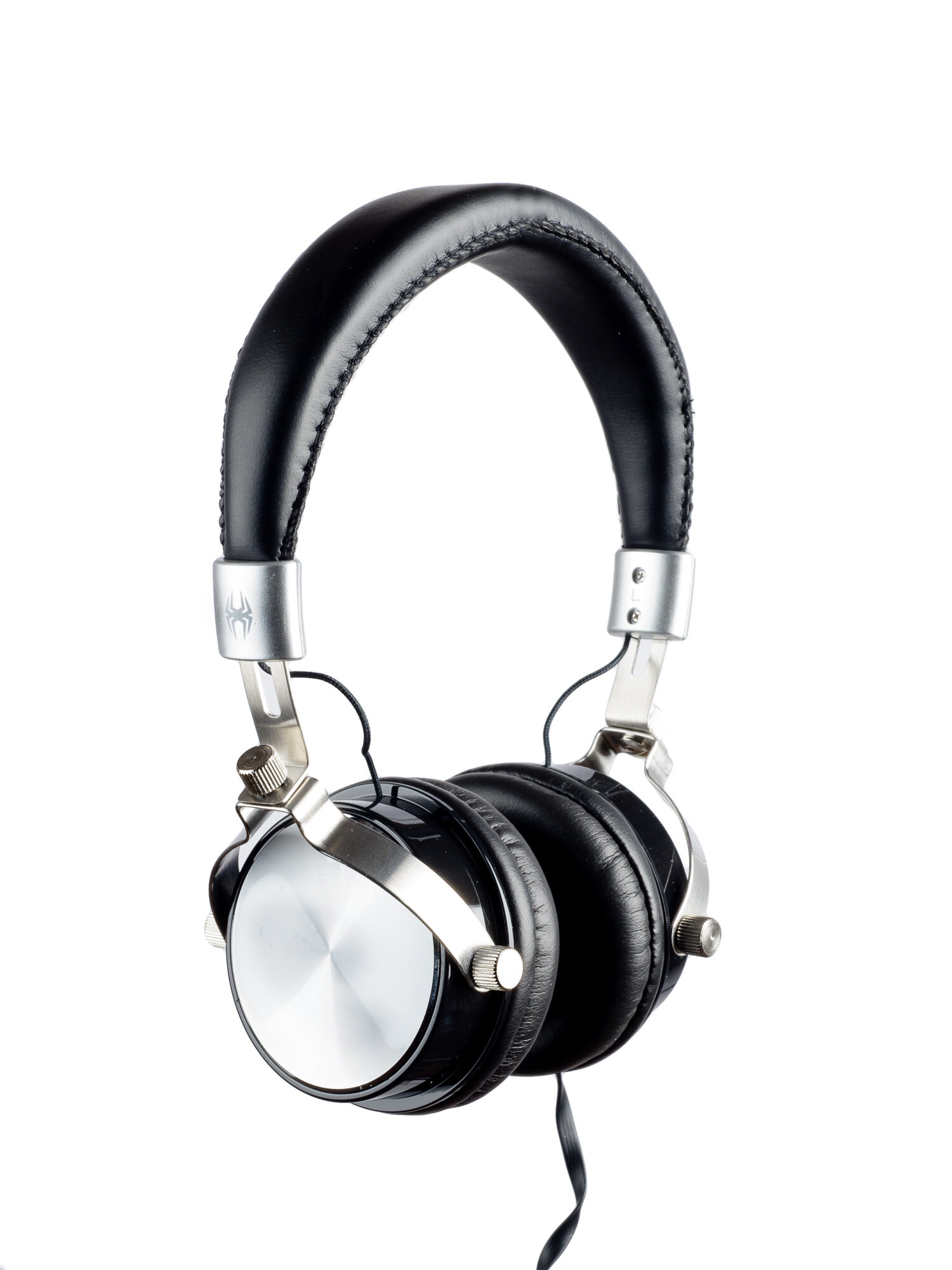 Black over-ear headphones with silver accents on a white background.