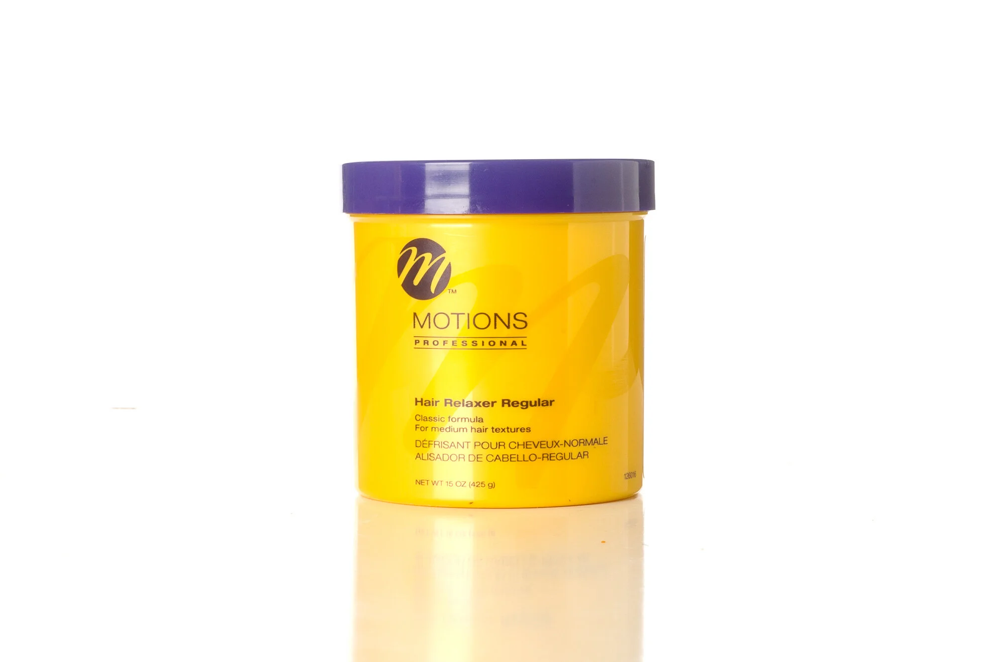 Motions Professional Hair Relaxer Regular in a yellow container with a purple lid.