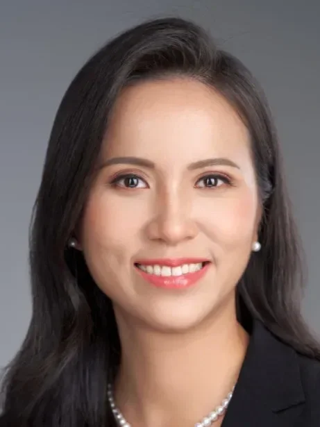 A headshot of an Asian woman