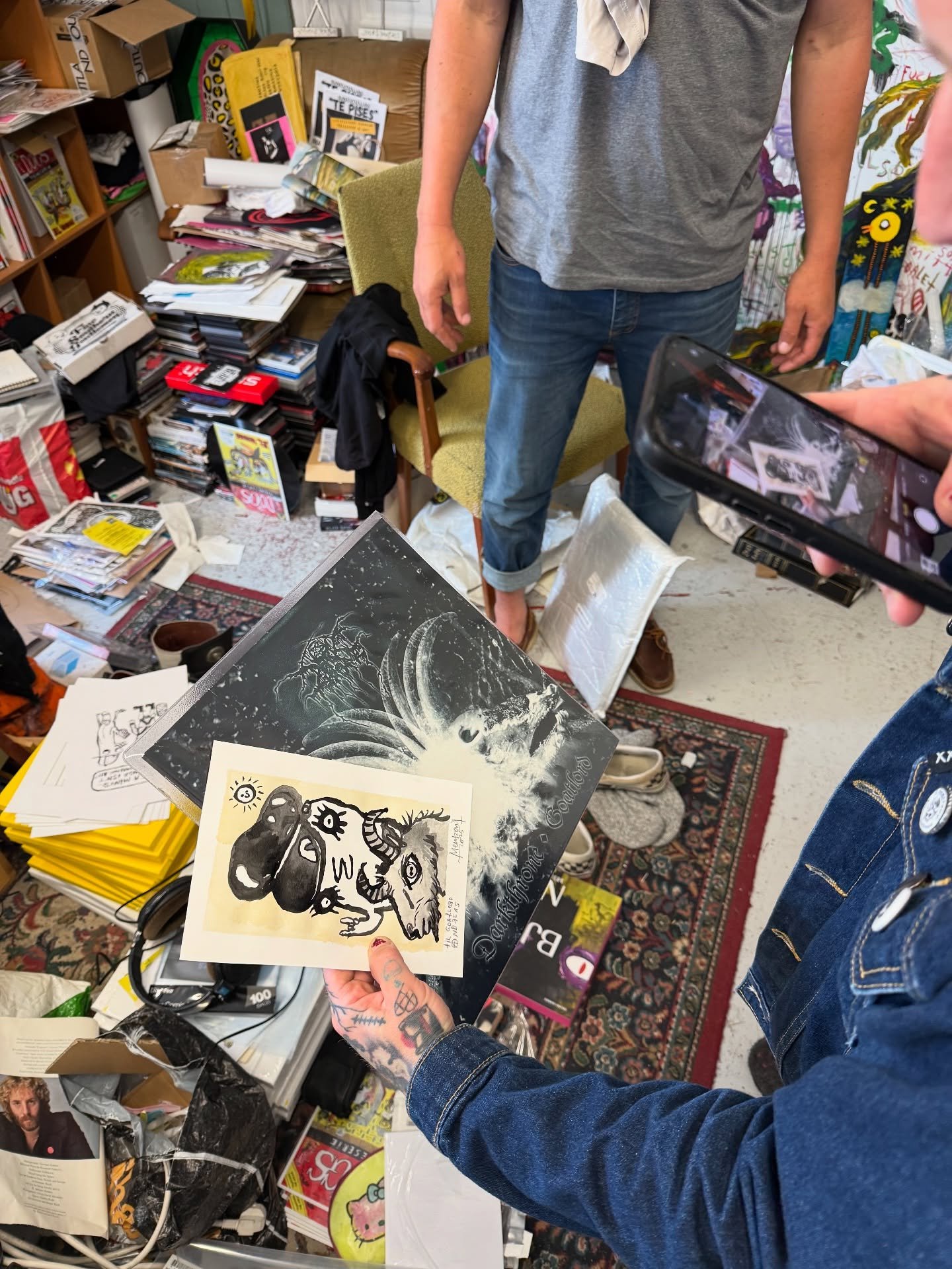 Studio visit with Martin Mentzoni, Haugesund.

Functionally a zine explosion disguised as a living arrangement. Plastic skulls, rotting cardboard, dead formats, GG Allin. Nothing in the space could be mistaken for a product. An aggressively anti-arch