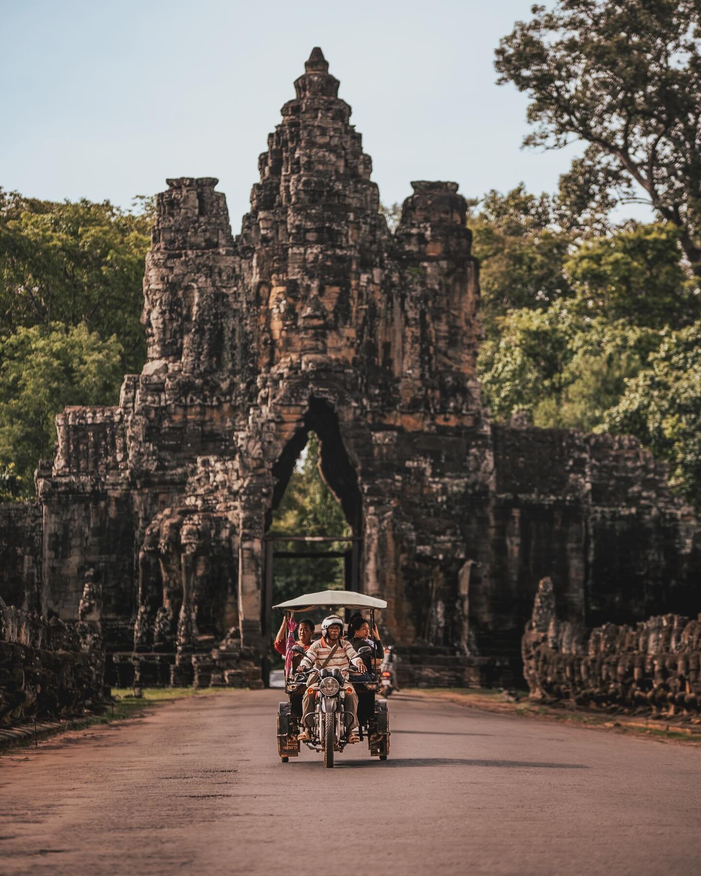 Lost in the timeless beauty of Angkor Wat&rsquo;s majestic gates. Each entrance whispers tales of ancient grandeur and mystique.

There are 4 gates surrounding the Temples of Angkor Wat, each similar but also different.

Canon R3
70-200mm f/2.8
ISO 1