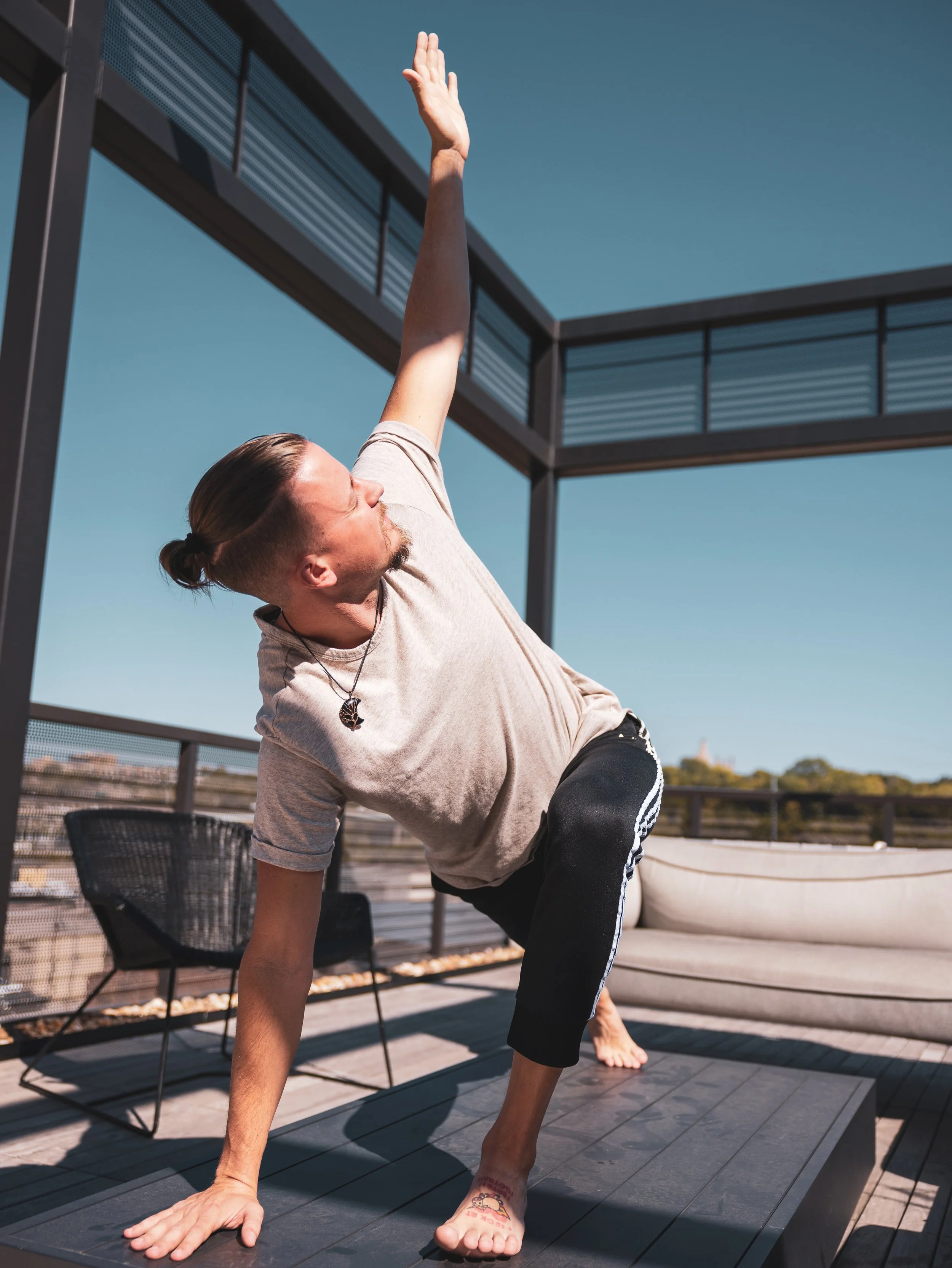 Spencer Ellsperman is a yoga instructor in Kansas City, MO. He teaches yoga classes out of Wellness Warehouse KC.