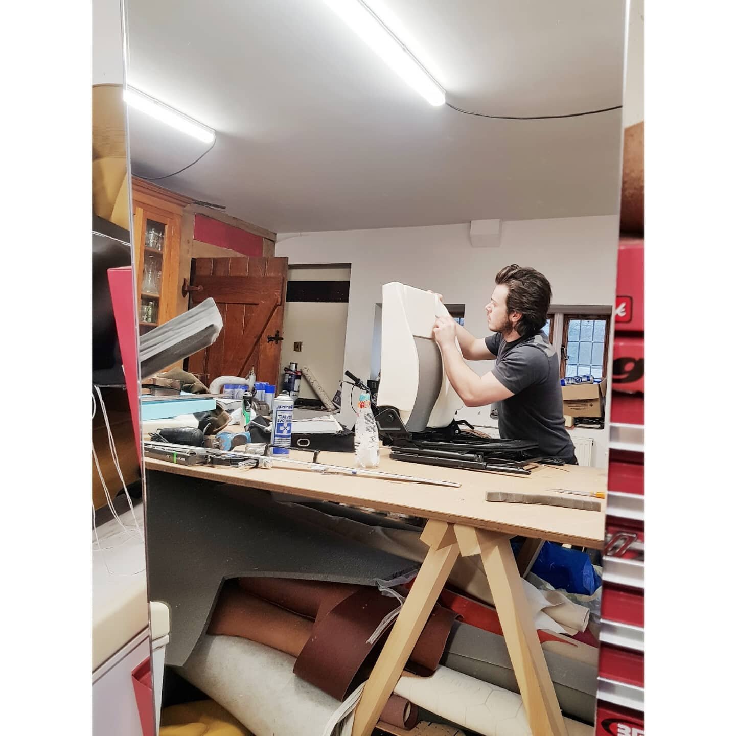 There's still the painstaking task of working out all the little creases and aligning all the seams, but this set of custom stitched leather defender seats are really taking shape!

Matt hasn't even slowed down to let me take a non-blurry picture!

A