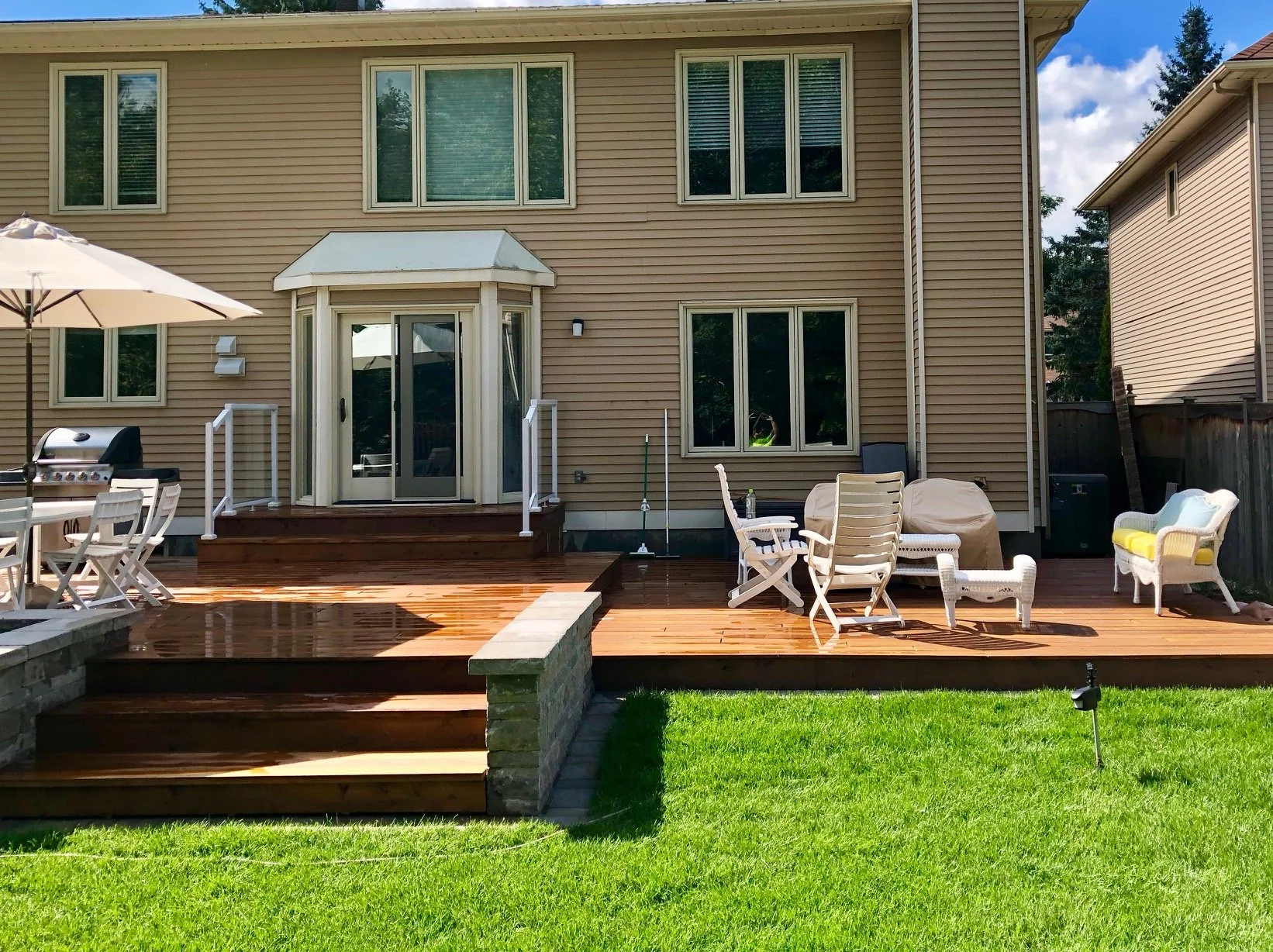 Pre- stained cedar decking built by Lanark Cedar 