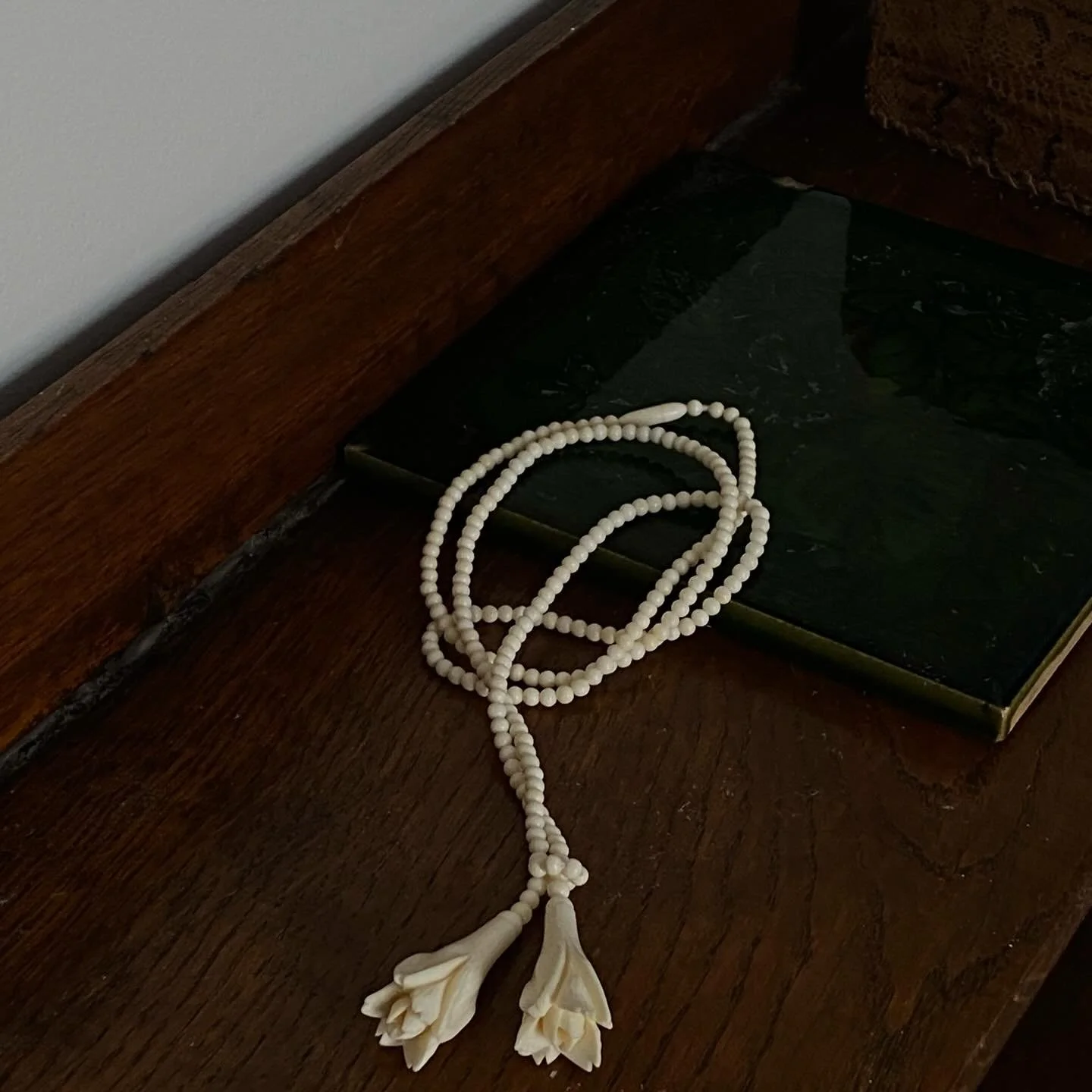 Ivory floral pendant.