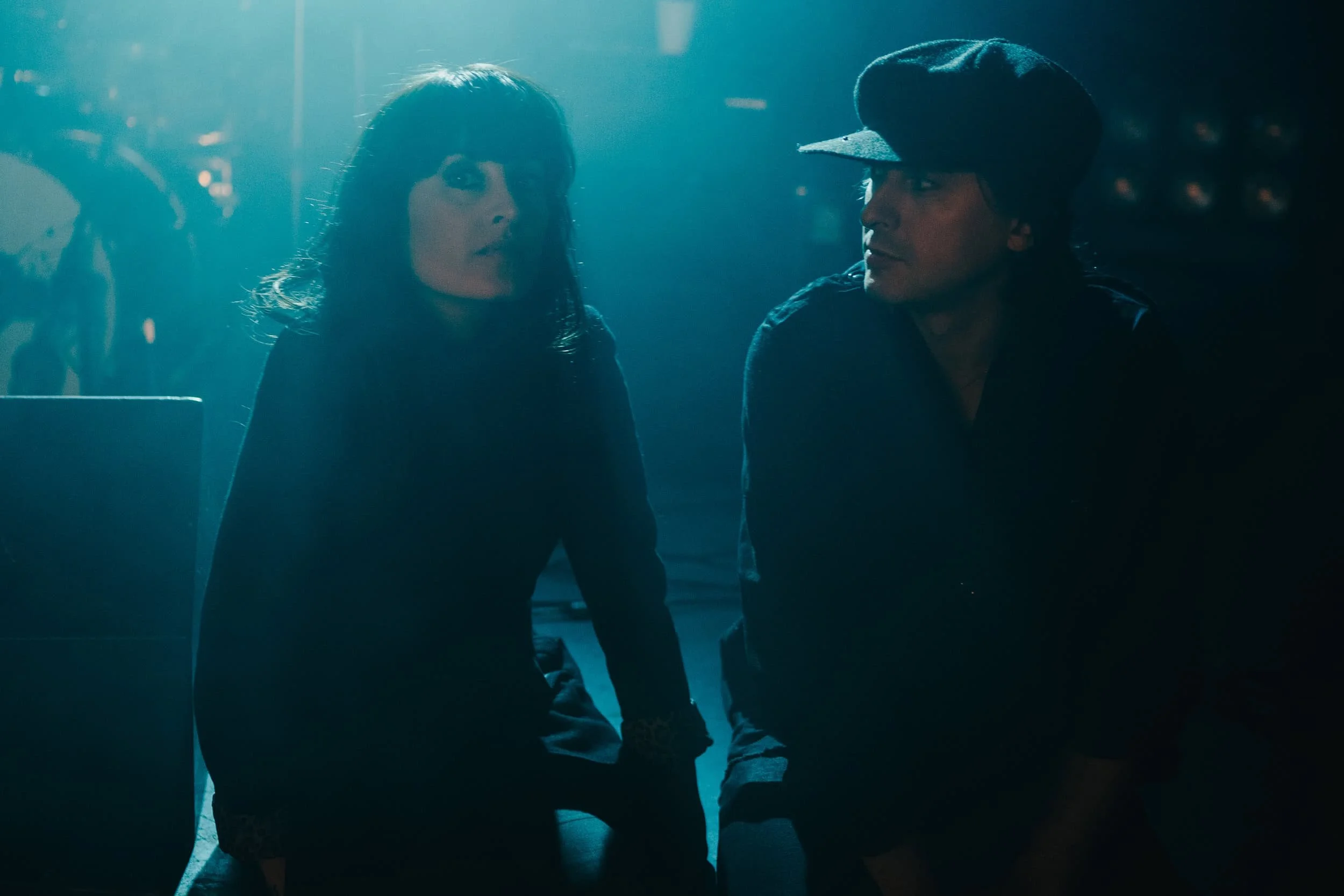 carl and lucie barat blue background portraits