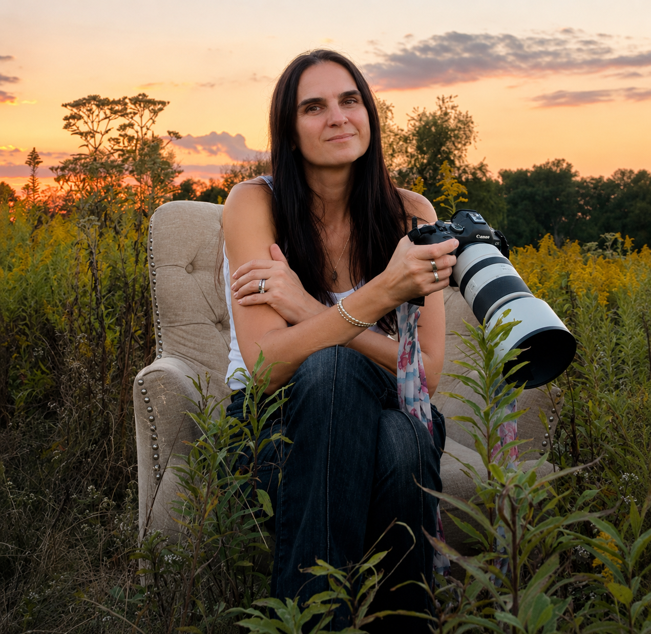 photographer sitting in field on chair