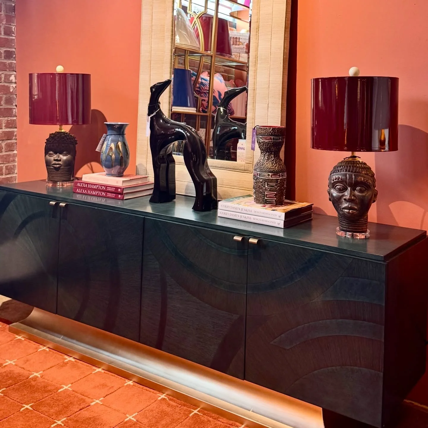 Oxblood in its natural habitat.

High gloss lacquer. Gold interior.
Finished with our Maison Blanc finials for contrast.

Color holds its own when the glow is right.